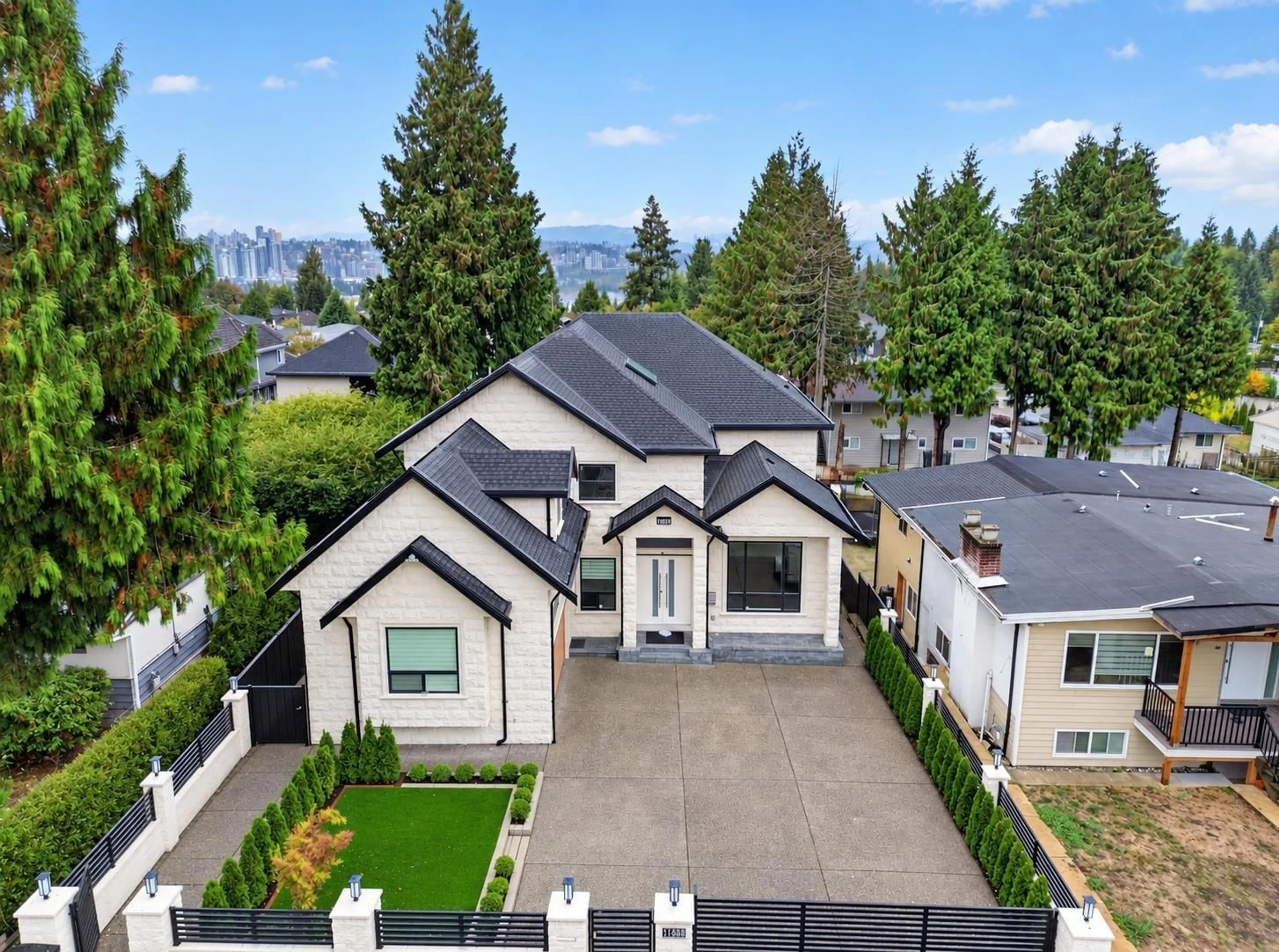 A pic from outside/outdoor area/front of a property/back of a property/a pic from drone, mountain view for 11689 96A AVENUE, Surrey British Columbia V3V2A2