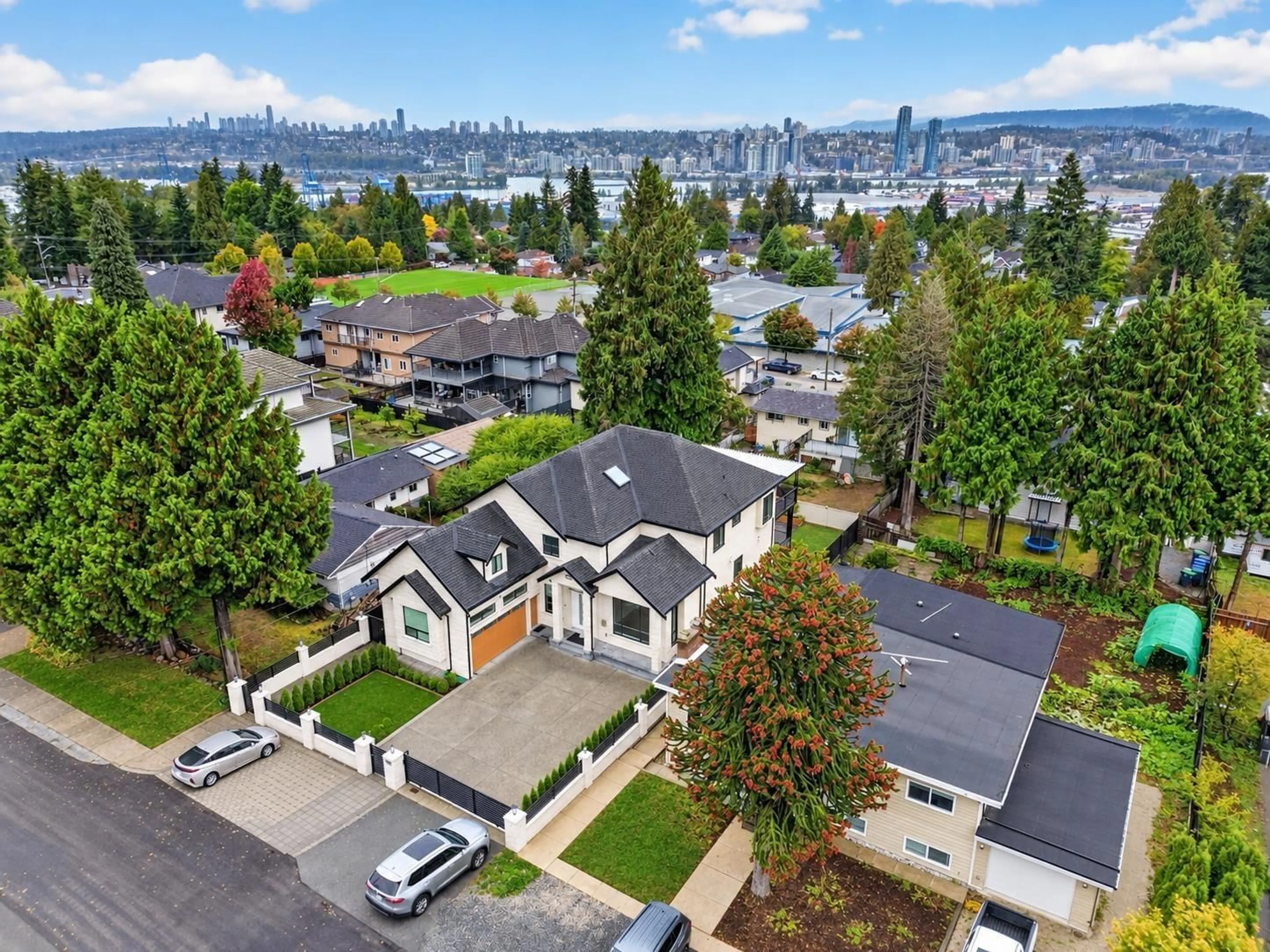 A pic from outside/outdoor area/front of a property/back of a property/a pic from drone, mountain view for 11689 96A AVENUE, Surrey British Columbia V3V2A2