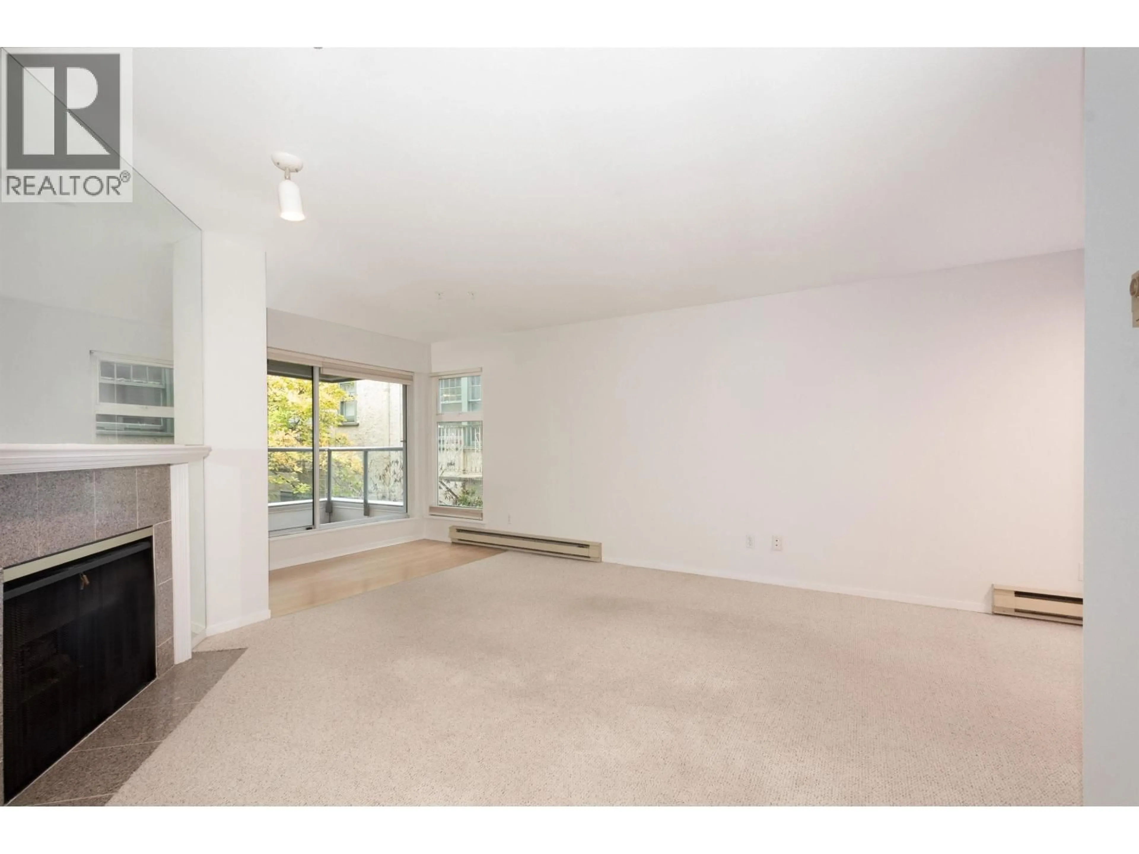 A pic of a room for 210 - 2250 3RD AVENUE, Vancouver British Columbia V6K1L4