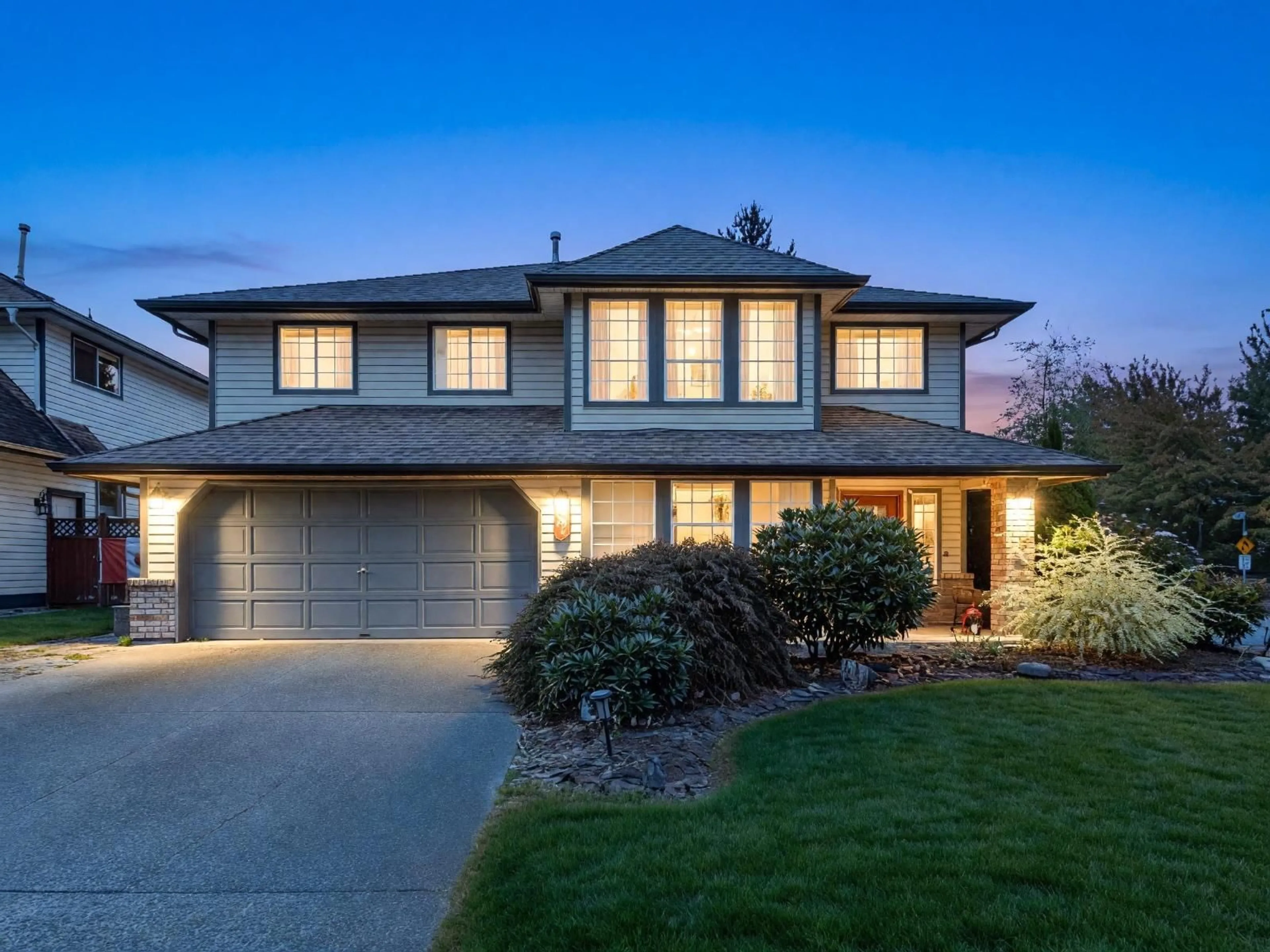 Home with vinyl exterior material, street for 8621 215 STREET, Langley British Columbia V1M2G4