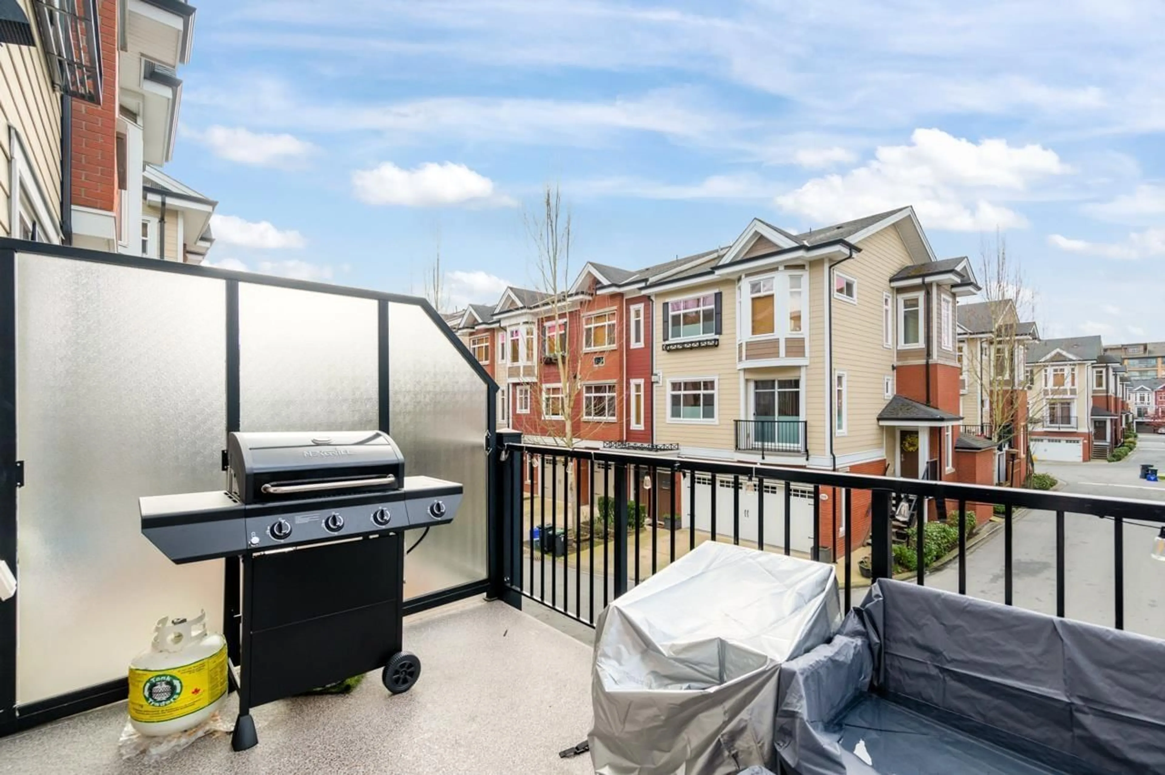 Patio, city buildings view from balcony for 43 - 8068 207 STREET, Langley British Columbia V2Y0M9