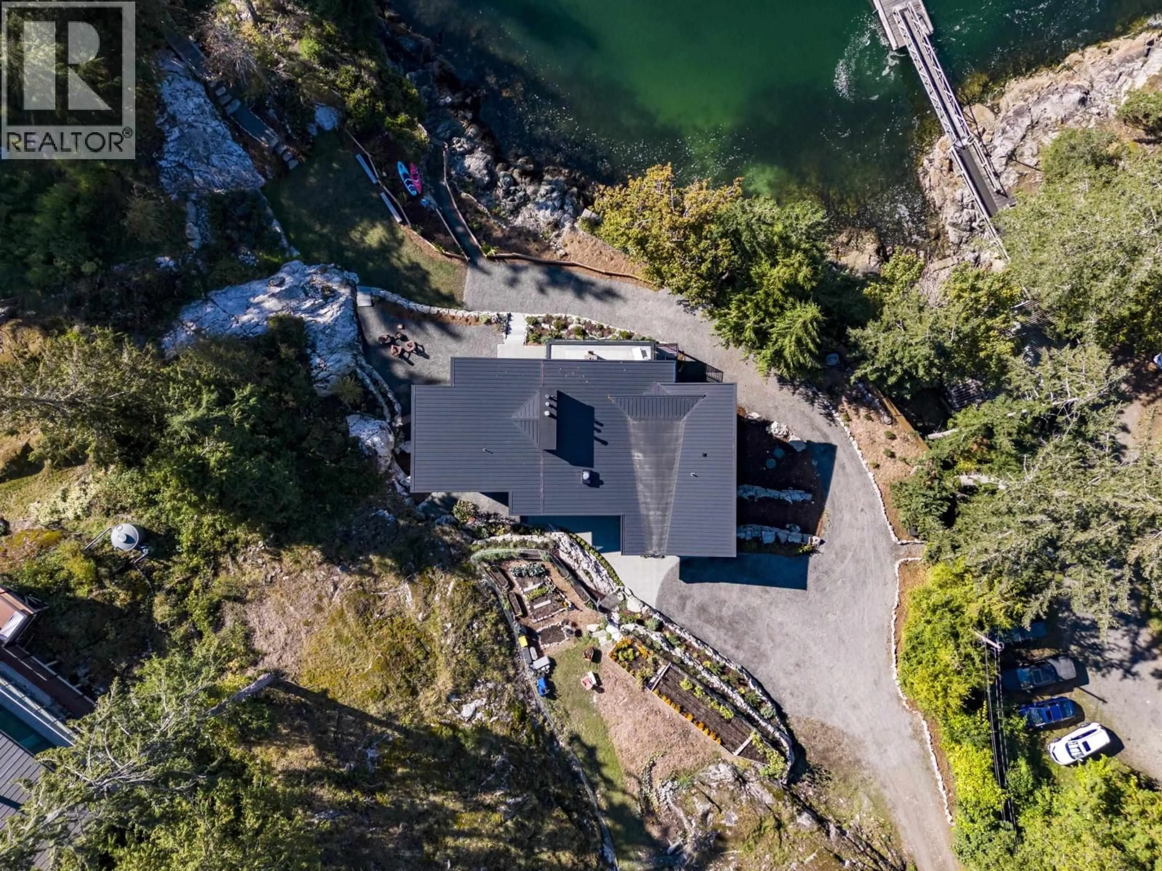A pic from outside/outdoor area/front of a property/back of a property/a pic from drone, water/lake/river/ocean view for 1724 BOWEN BAY ROAD, Bowen Island British Columbia V0N1G2