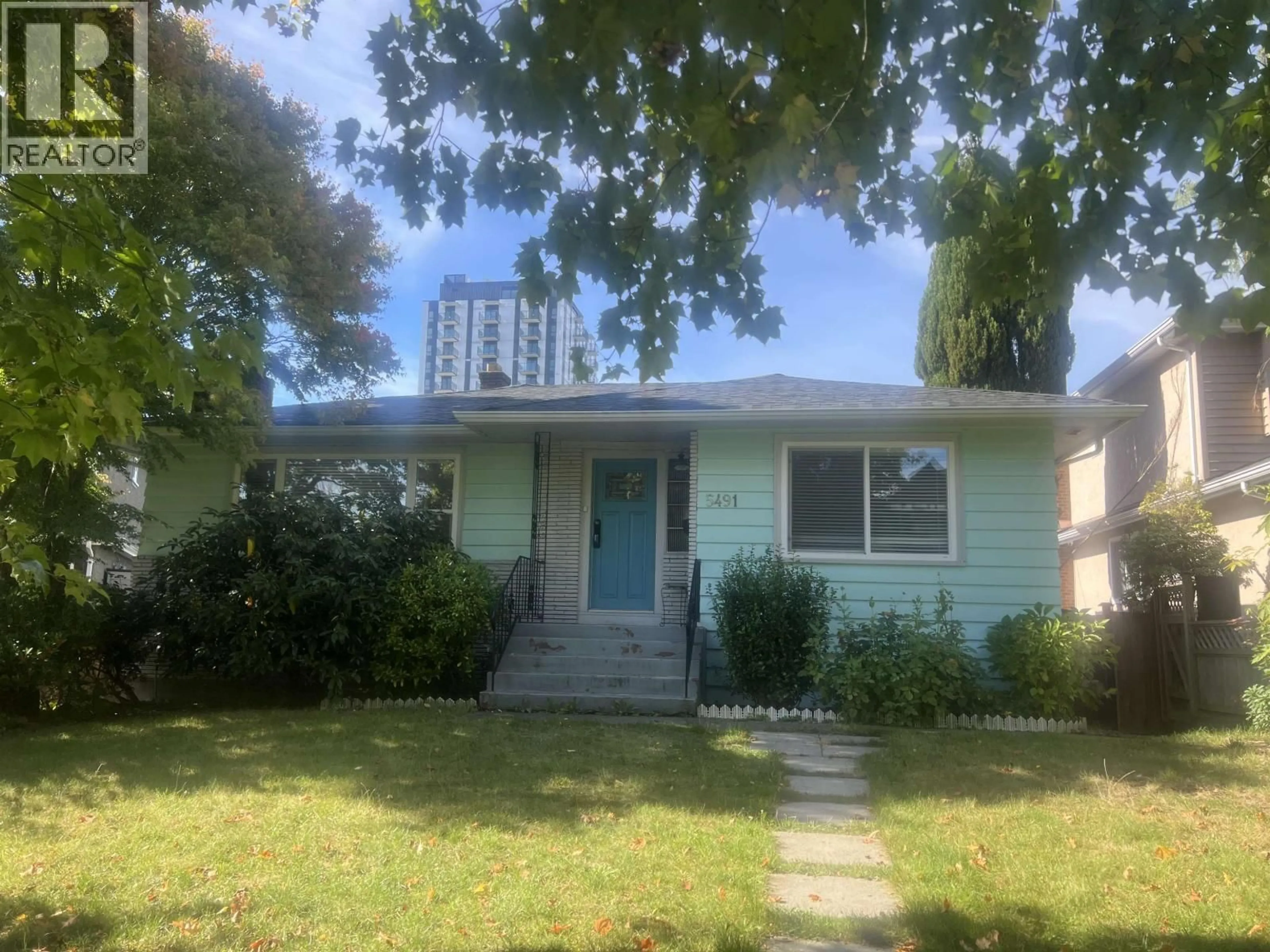 Home with vinyl exterior material, street for 5491 ELIZABETH STREET, Vancouver British Columbia V5X3M3