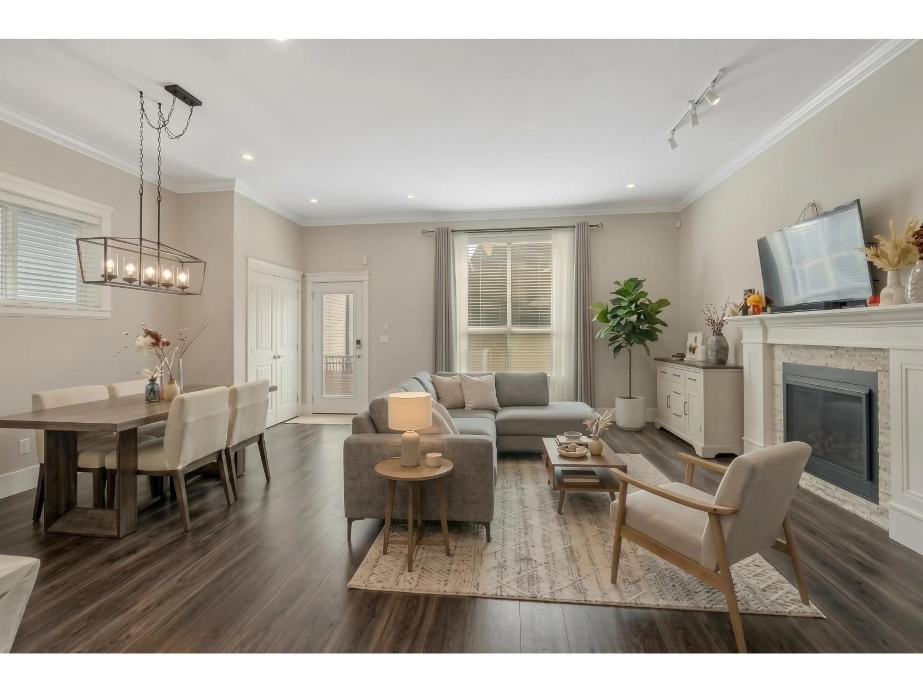 Living room with furniture, wood/laminate floor for 19562 72A AVENUE, Surrey British Columbia V4N6P4