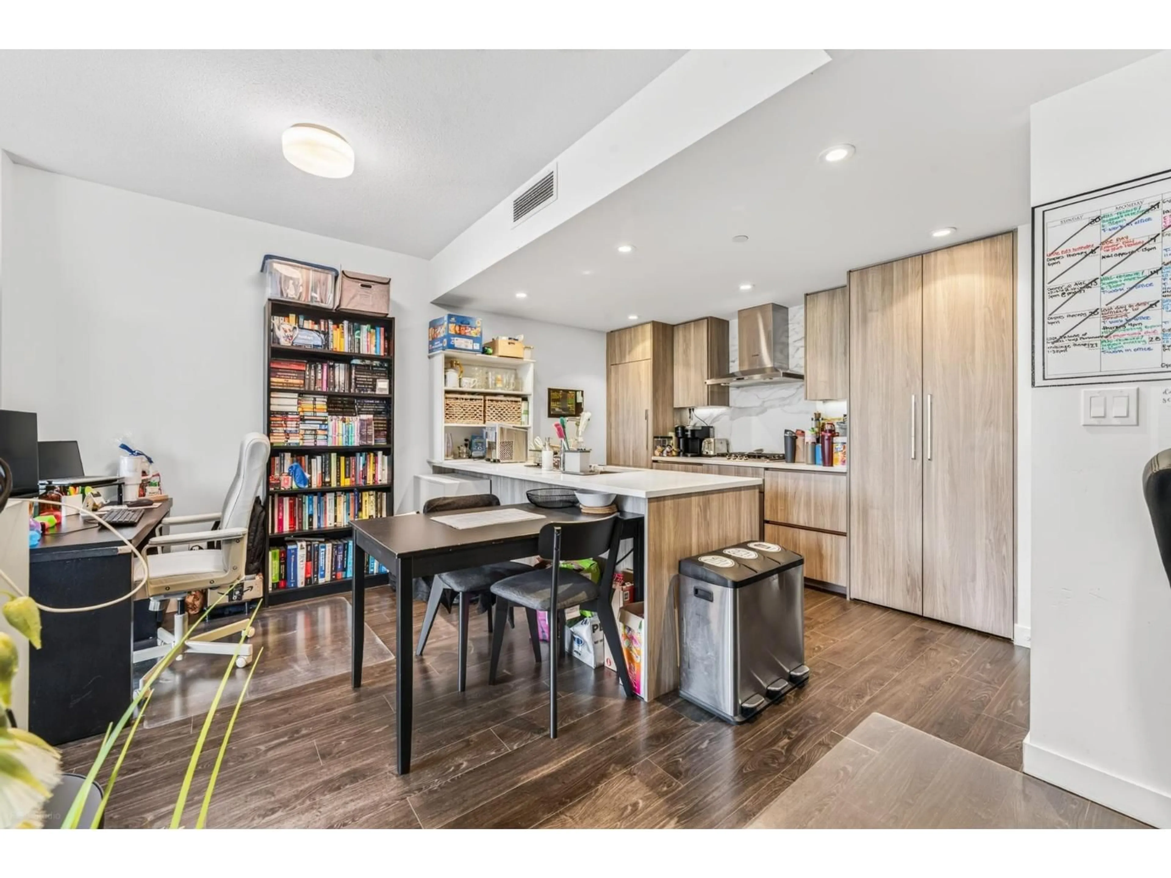 Open concept kitchen, wood/laminate floor for 505 - 9887 WHALLEY BOULEVARD, Surrey British Columbia V3T0P4