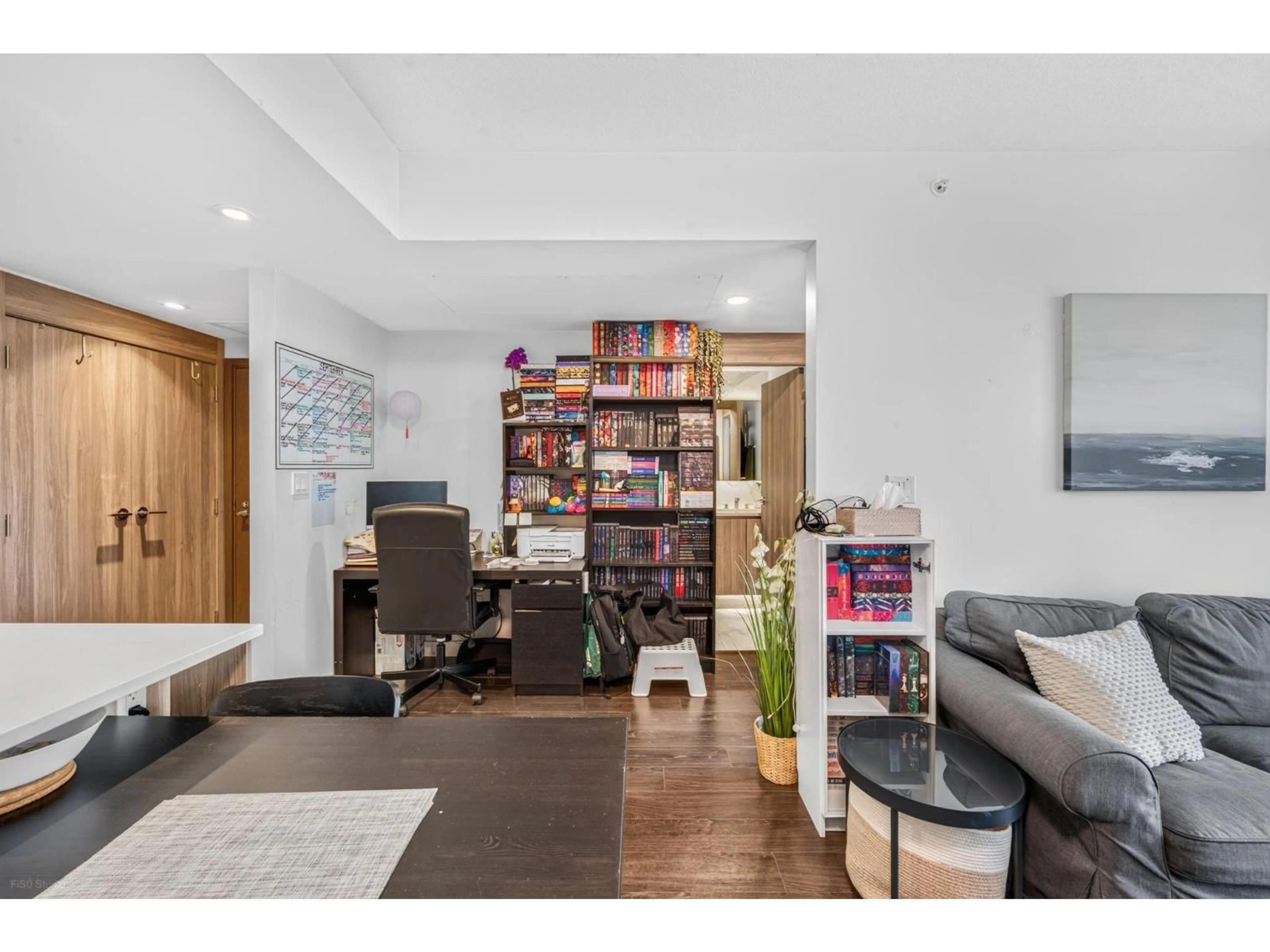 Living room with furniture, wood/laminate floor for 505 - 9887 WHALLEY BOULEVARD, Surrey British Columbia V3T0P4