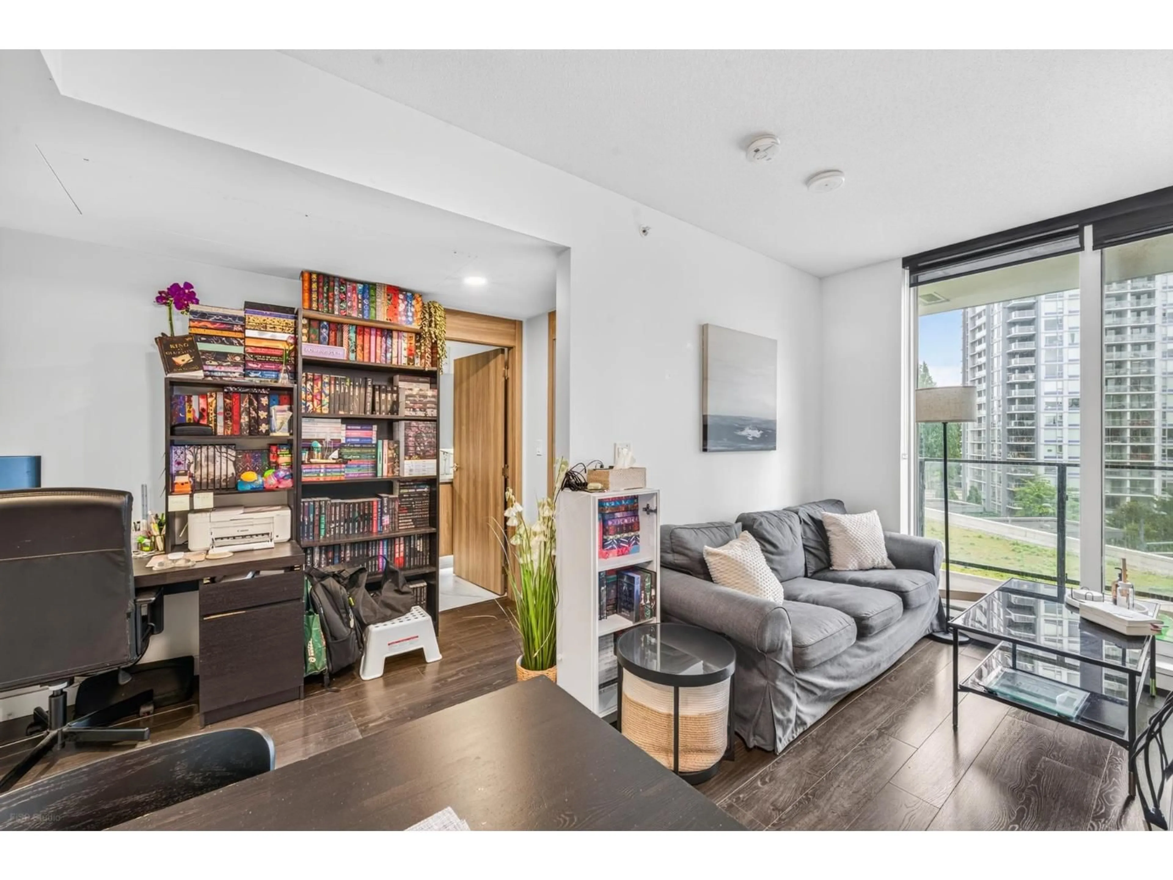 Living room with furniture, wood/laminate floor for 505 - 9887 WHALLEY BOULEVARD, Surrey British Columbia V3T0P4