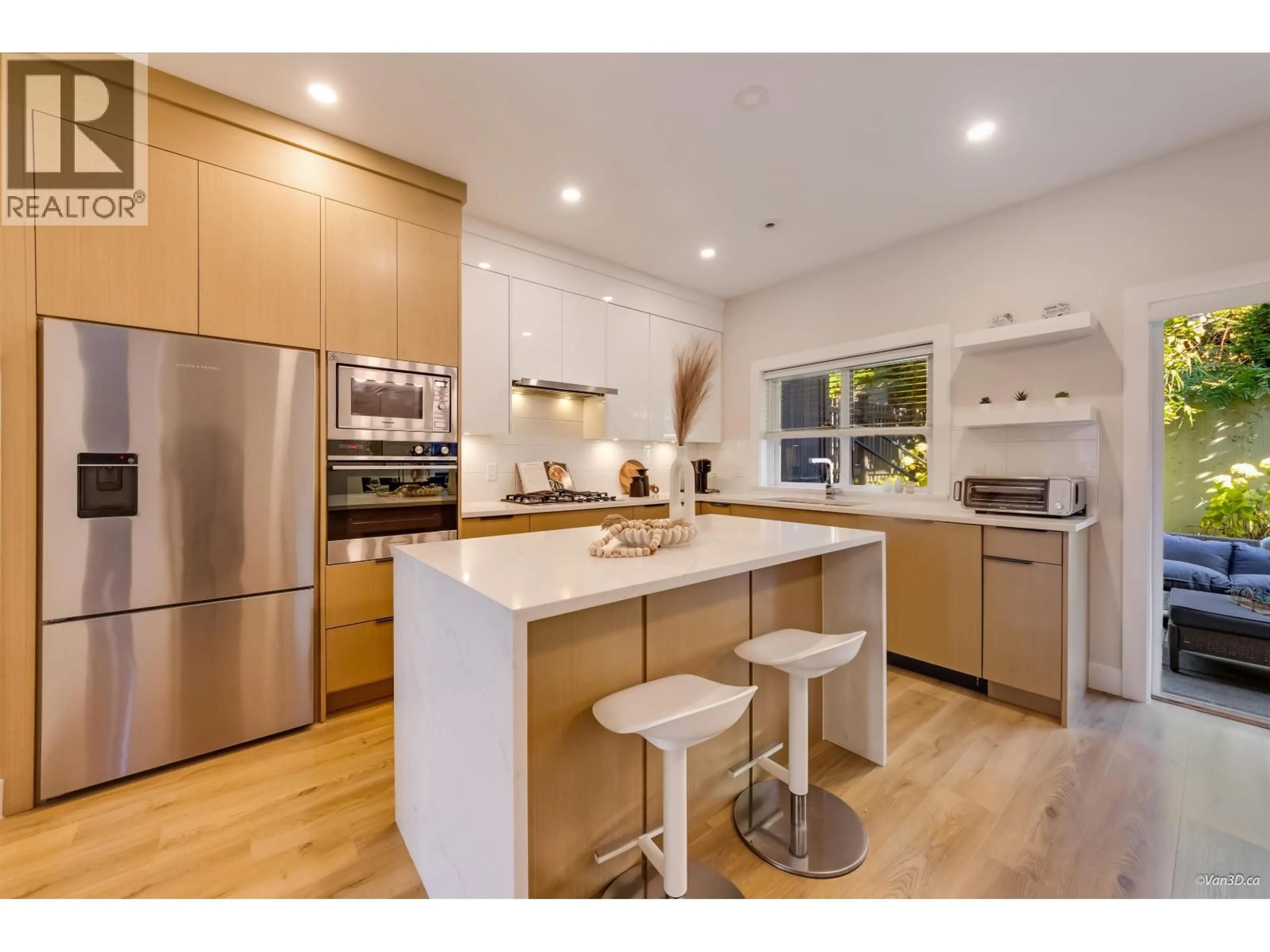 Open concept kitchen, wood/laminate floor for 116 - 3409 HARPER ROAD, Coquitlam British Columbia V3E0S9