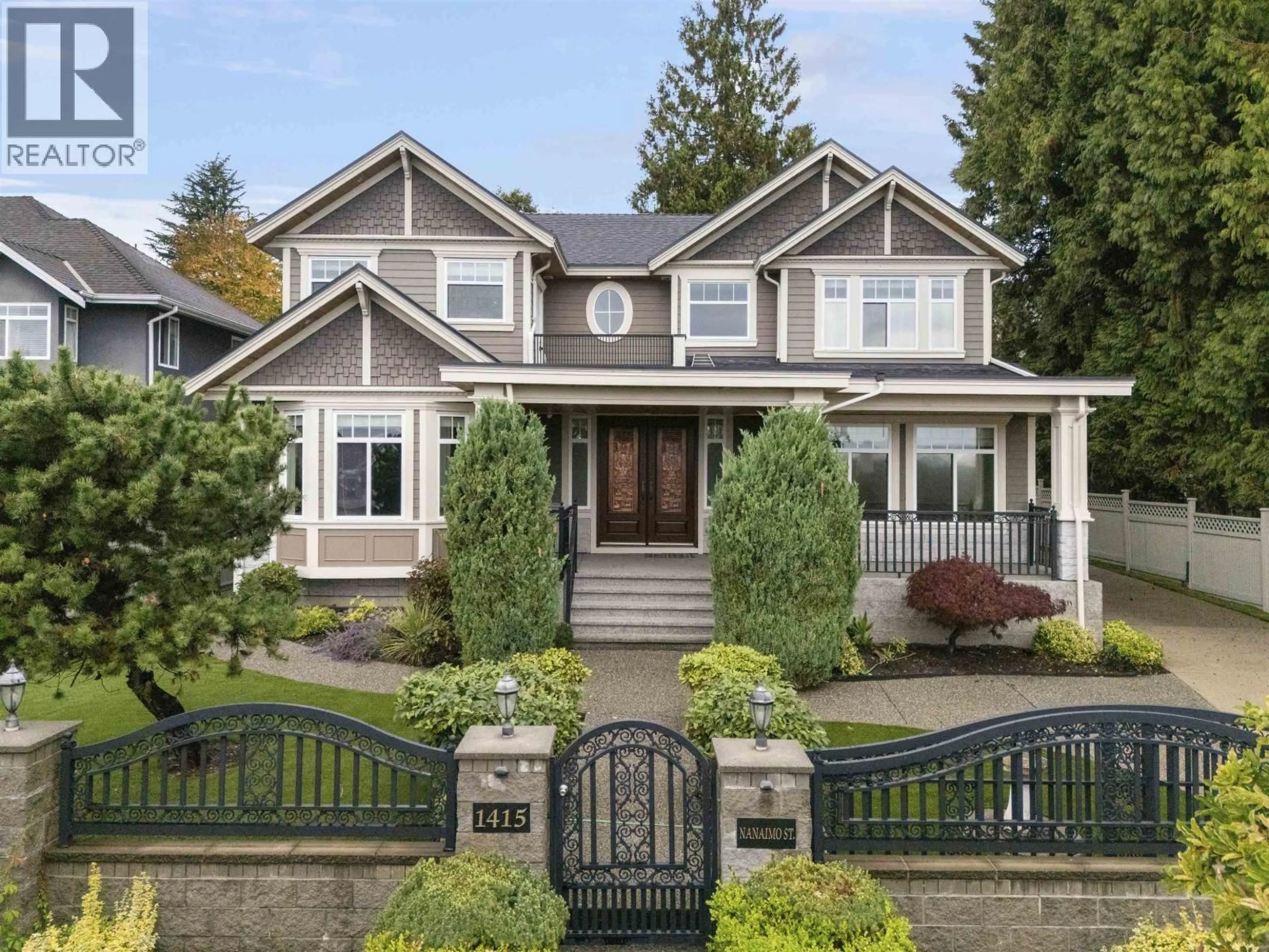 Home with vinyl exterior material, street for 1415 NANAIMO STREET, New Westminster British Columbia V3M2G3