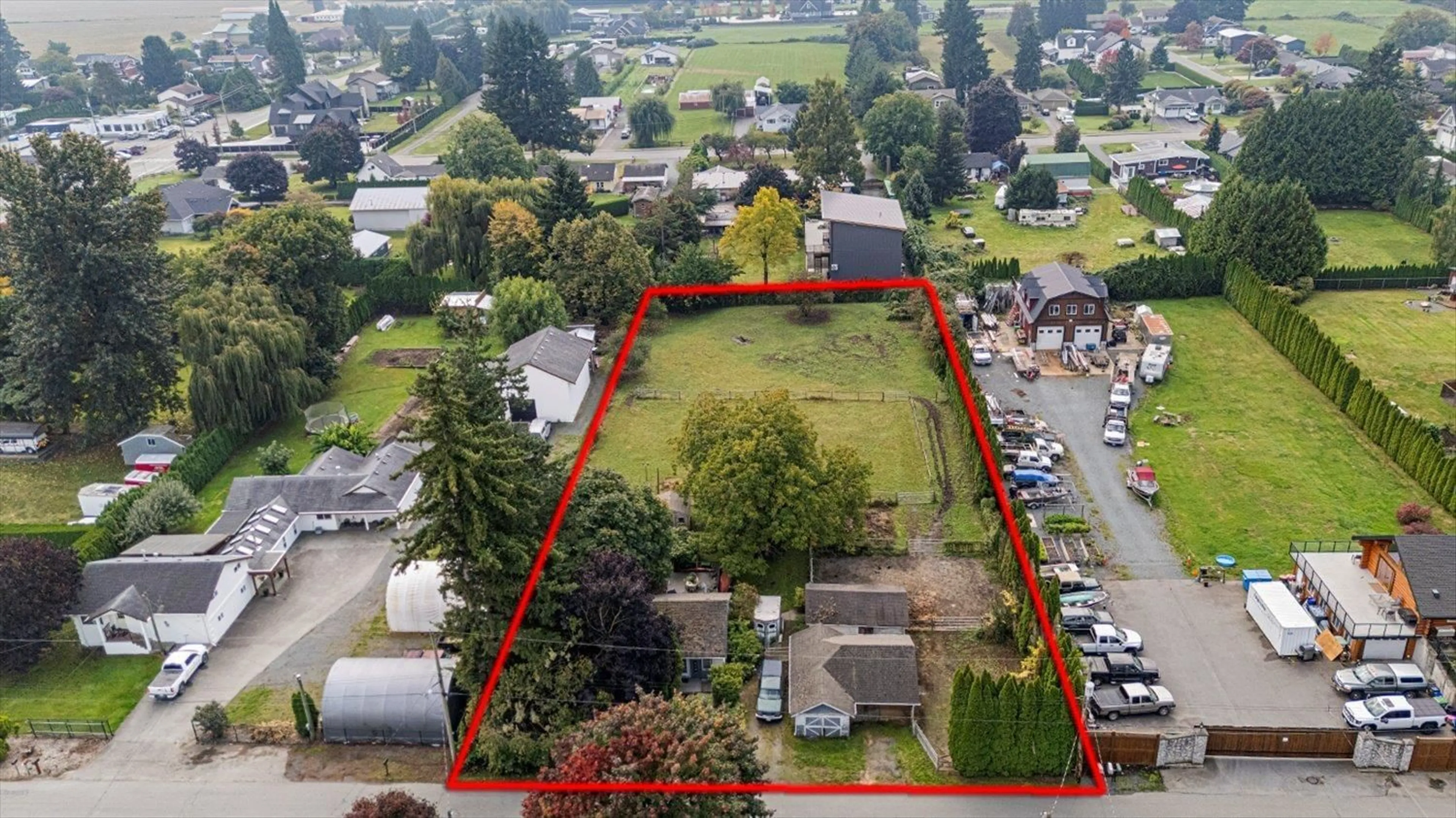 A pic from outside/outdoor area/front of a property/back of a property/a pic from drone, street for 42518 PETERS ROAD, Sardis - Greendale British Columbia V2R4K3