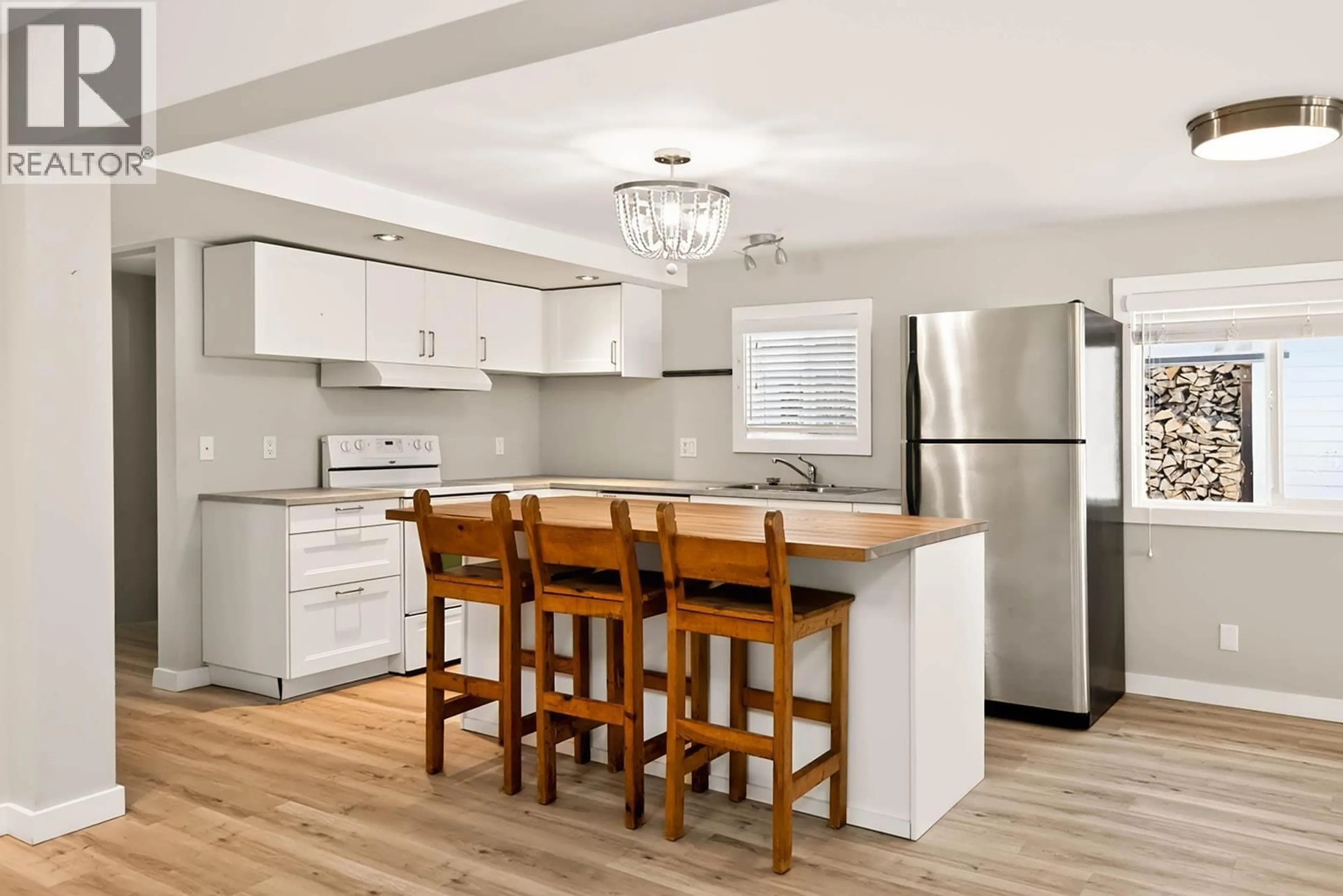Open concept kitchen, wood/laminate floor for 1413 SUNSHINE COAST HIGHWAY, Gibsons British Columbia V0N1V5