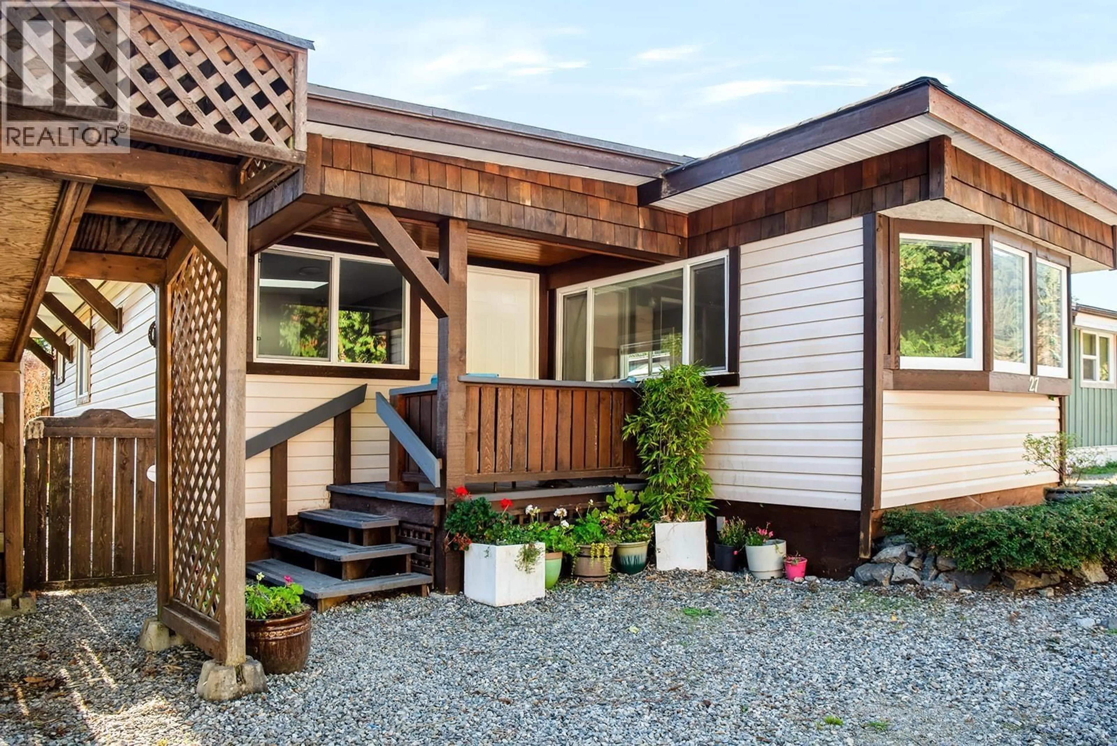 Home with vinyl exterior material, street for 1413 SUNSHINE COAST HIGHWAY, Gibsons British Columbia V0N1V5