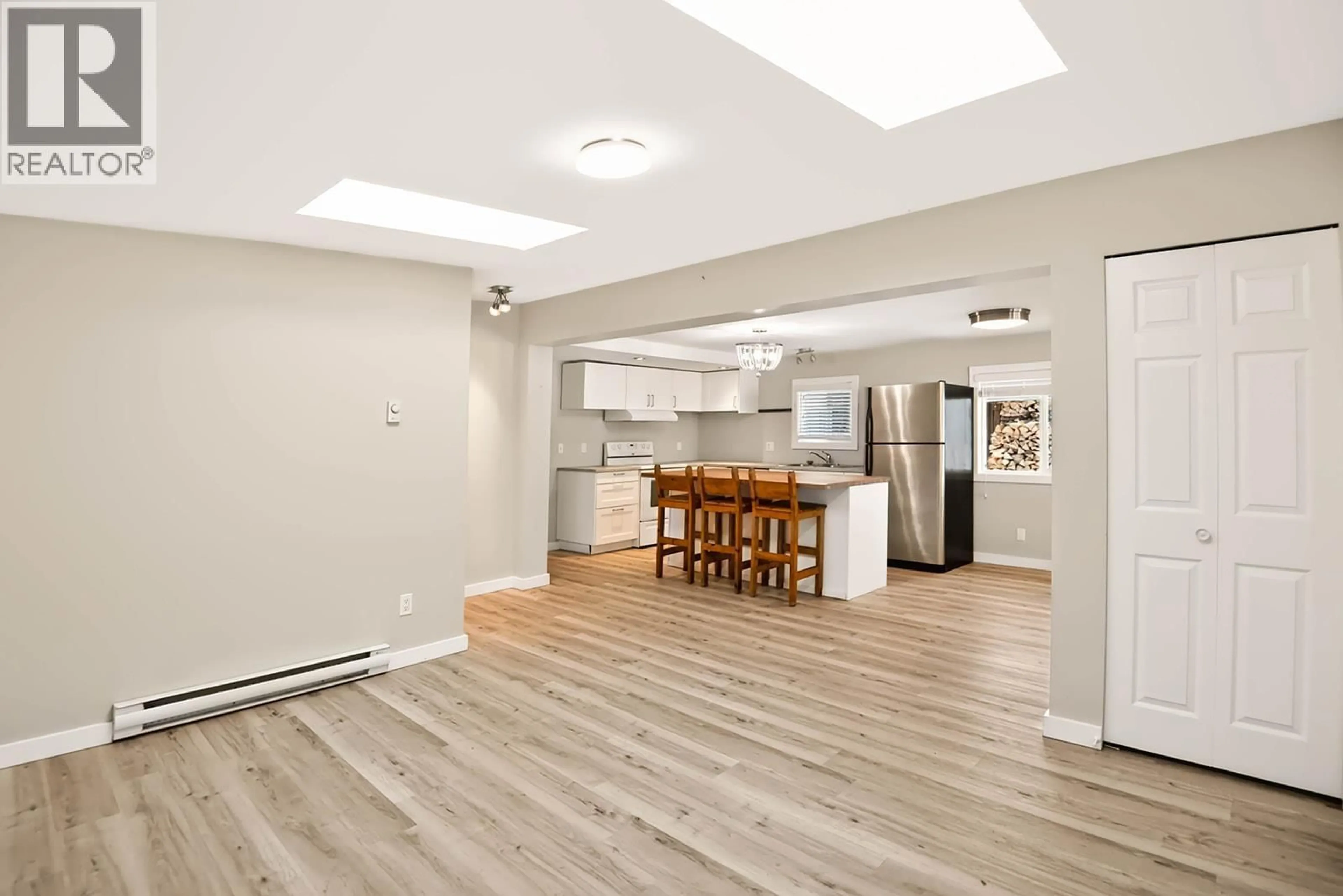 Open concept kitchen, wood/laminate floor for 1413 SUNSHINE COAST HIGHWAY, Gibsons British Columbia V0N1V5