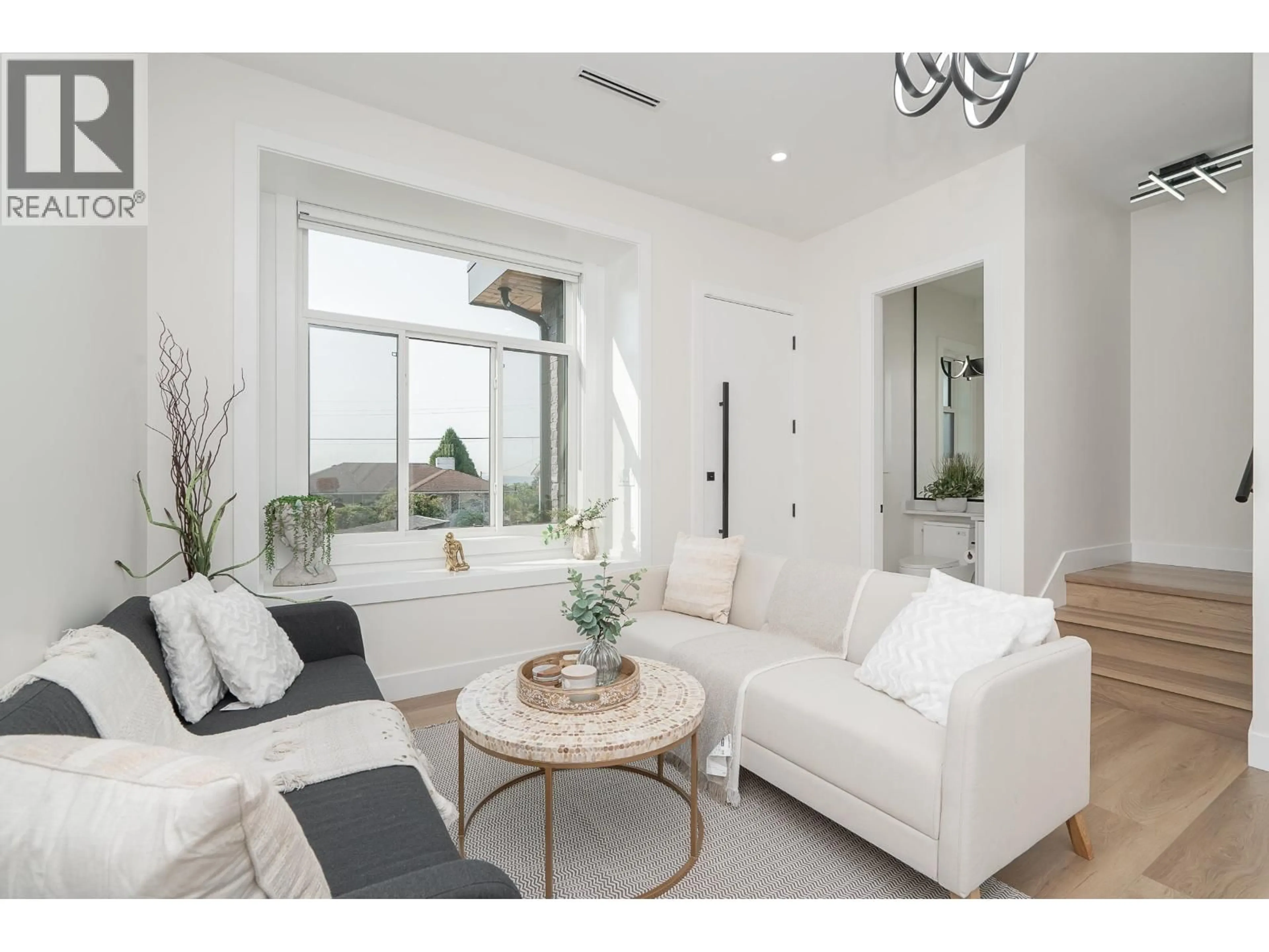 Living room with furniture, unknown for 102 - 1149 DANSEY AVENUE, Coquitlam British Columbia V3K3H5