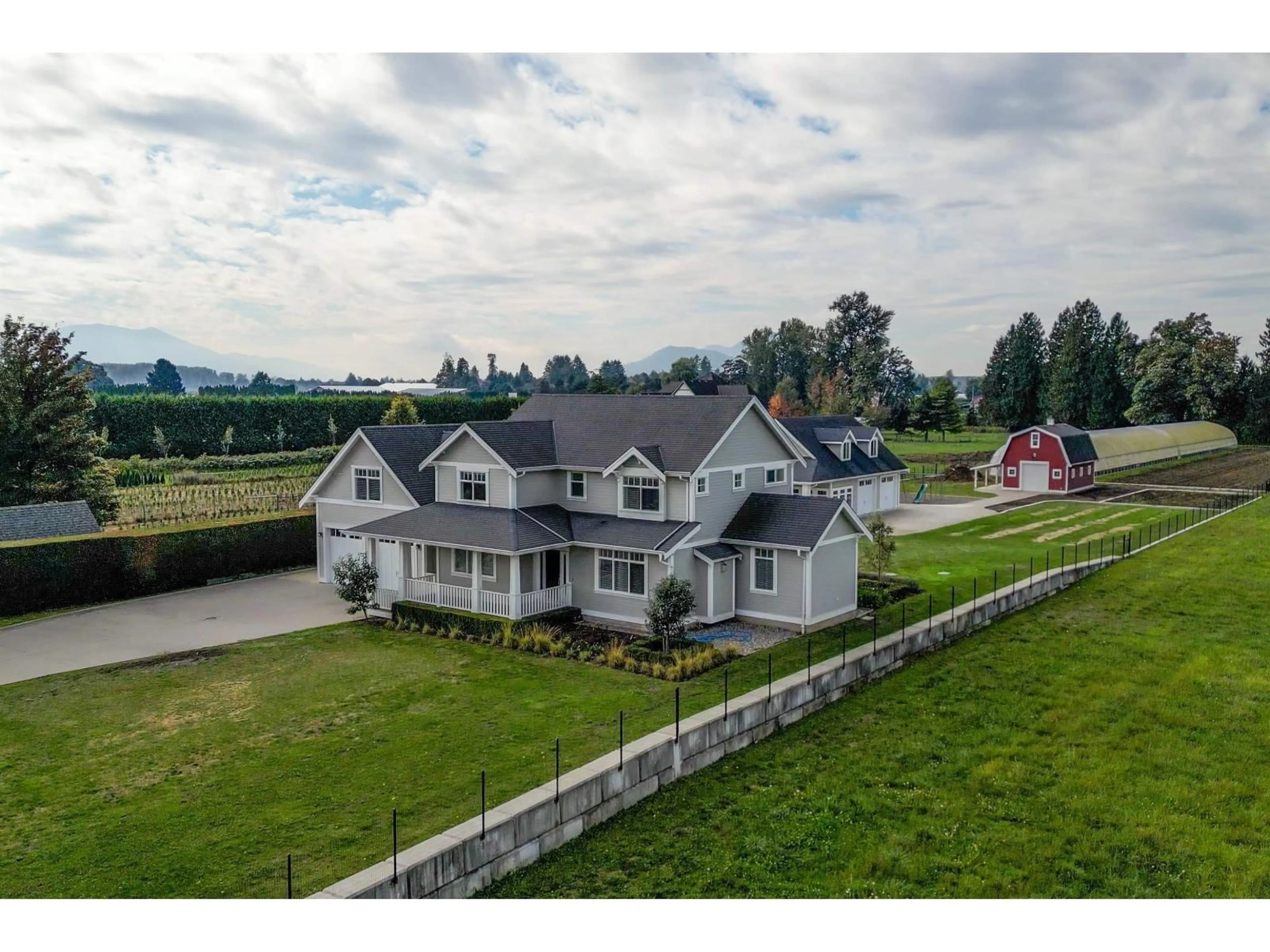 A pic from outside/outdoor area/front of a property/back of a property/a pic from drone, mountain view for 10995 MCSWEEN ROAD, Chilliwack British Columbia V2P7Z7