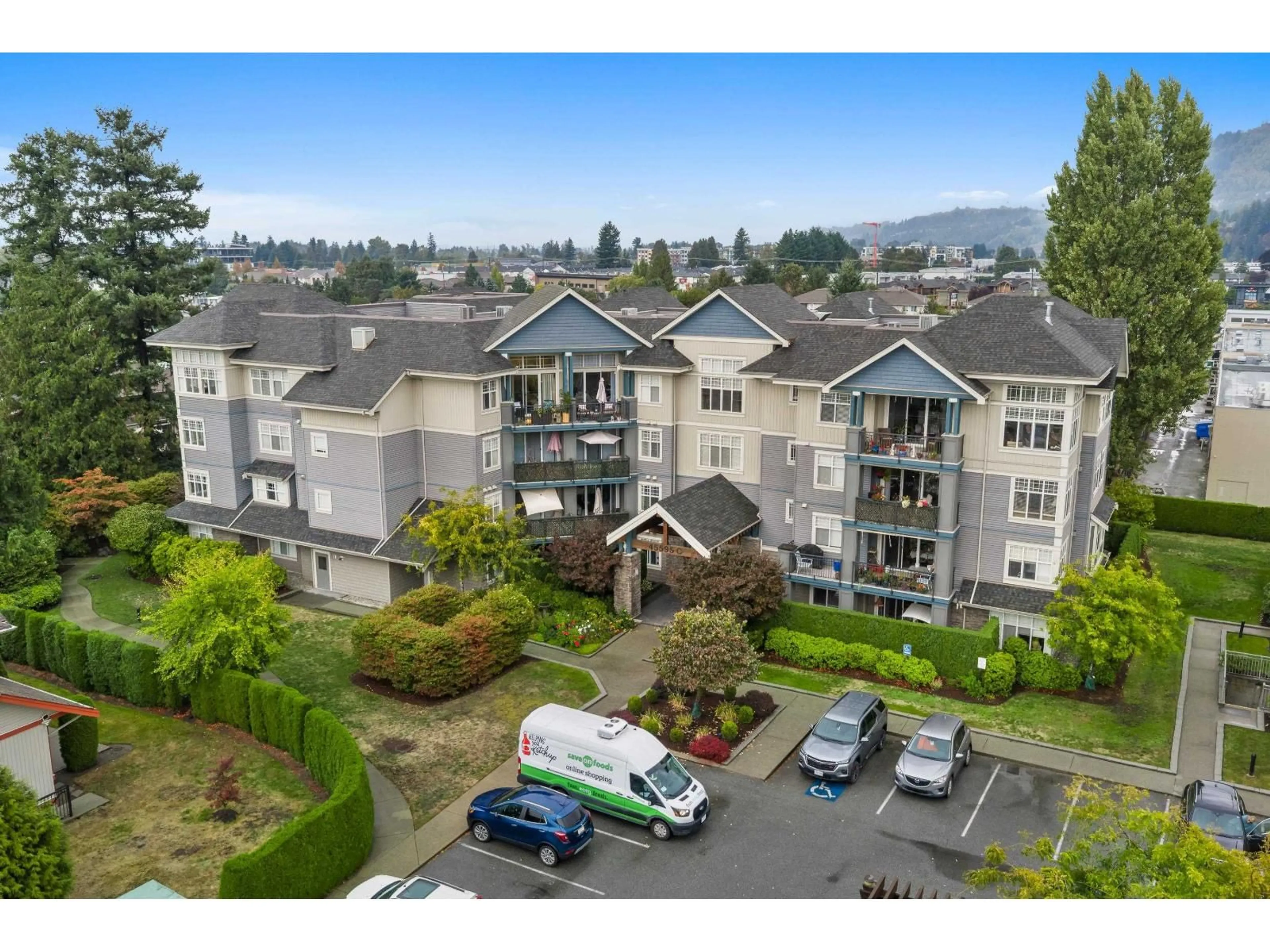 A pic from outside/outdoor area/front of a property/back of a property/a pic from drone, mountain view for 105C - 45595 TAMIHI WAY, Chilliwack British Columbia V2R0G3