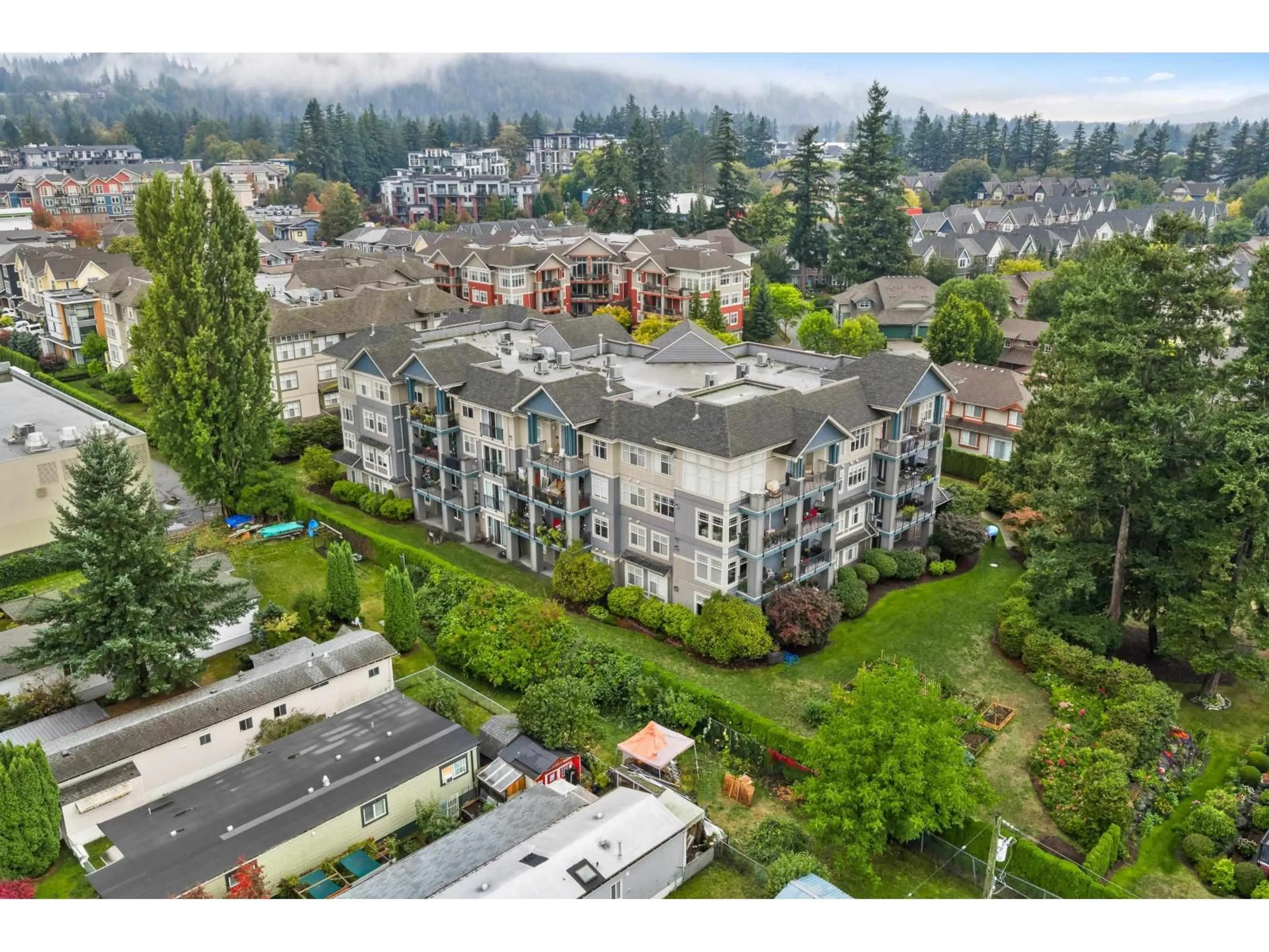 A pic from outside/outdoor area/front of a property/back of a property/a pic from drone, mountain view for 105C - 45595 TAMIHI WAY, Chilliwack British Columbia V2R0G3