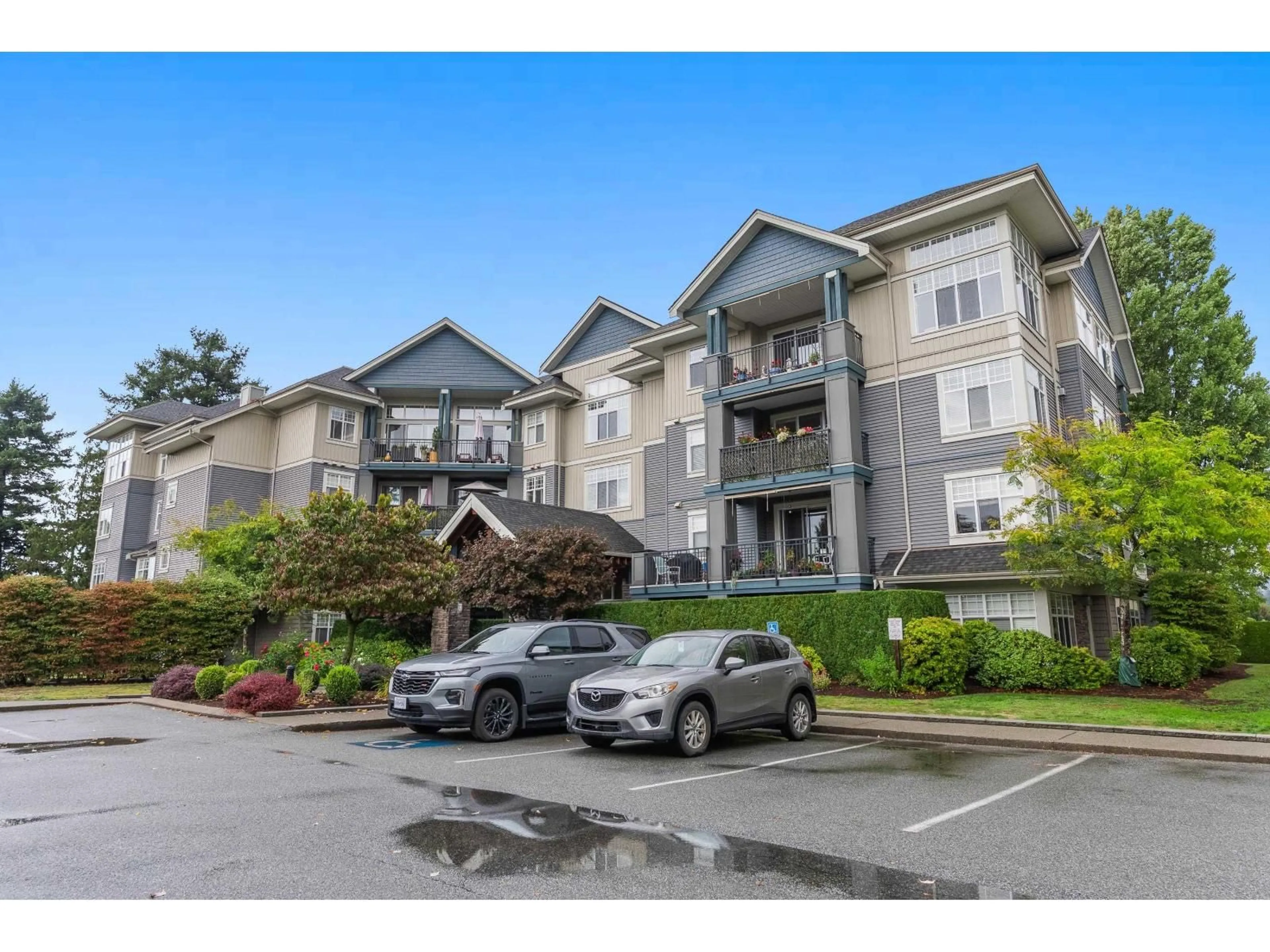 A pic from outside/outdoor area/front of a property/back of a property/a pic from drone, mountain view for 105C - 45595 TAMIHI WAY, Chilliwack British Columbia V2R0G3