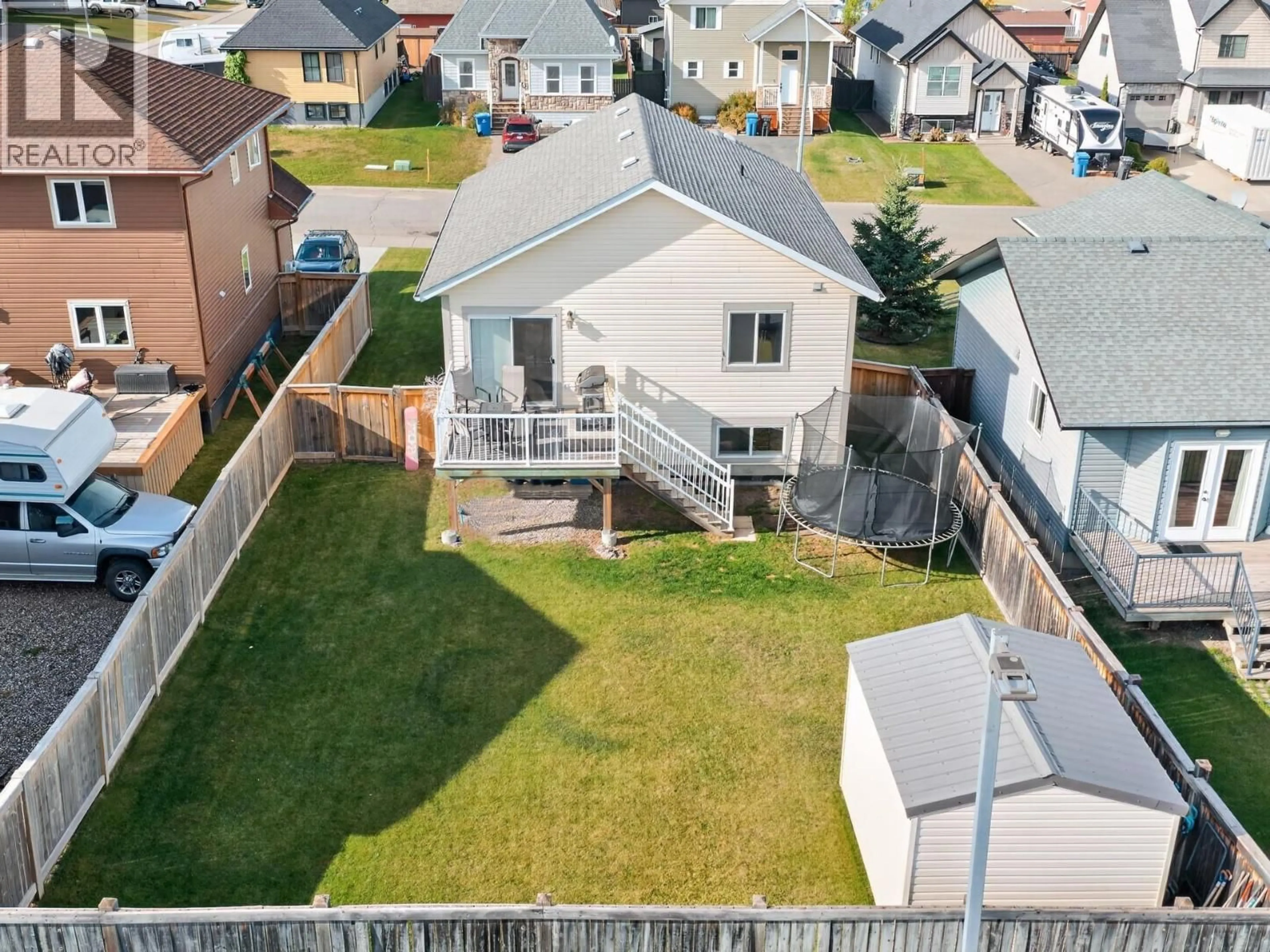 A pic from outside/outdoor area/front of a property/back of a property/a pic from drone, unknown for 11331 86A STREET, Fort St. John British Columbia V1J0G1