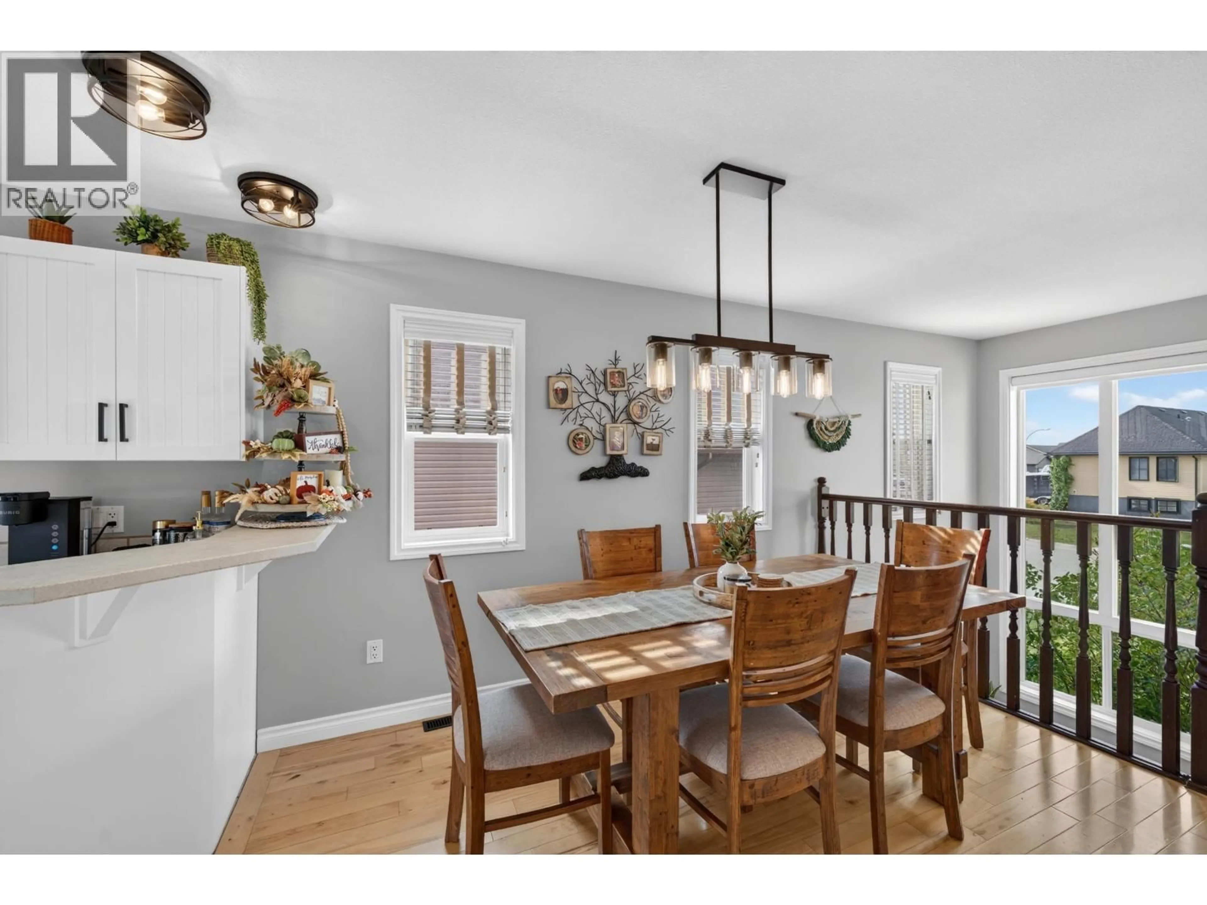 Open concept kitchen, wood/laminate floor for 11331 86A STREET, Fort St. John British Columbia V1J0G1