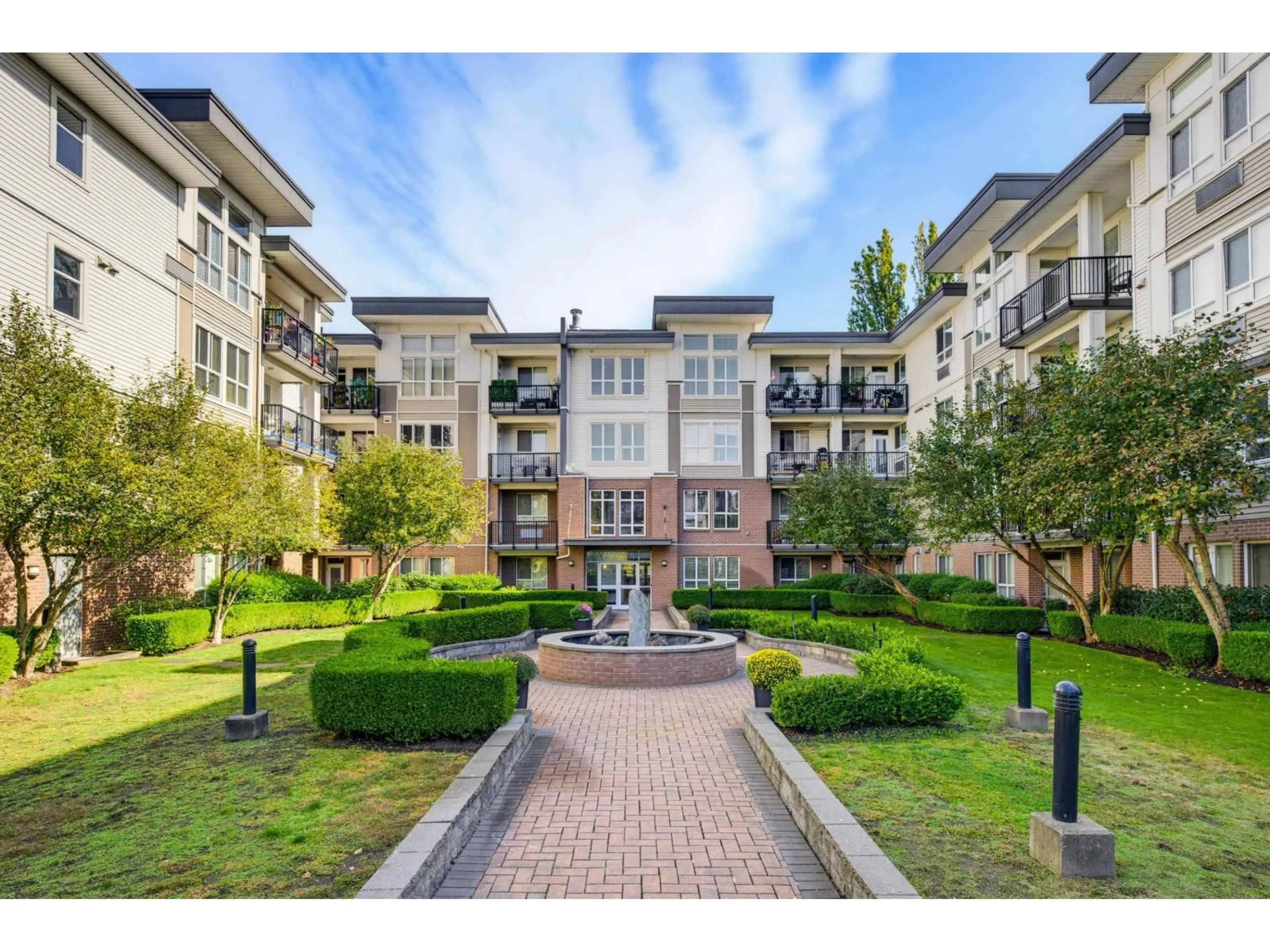 A pic from outside/outdoor area/front of a property/back of a property/a pic from drone, street for 202 - 5430 201 STREET, Langley British Columbia V3A0A2