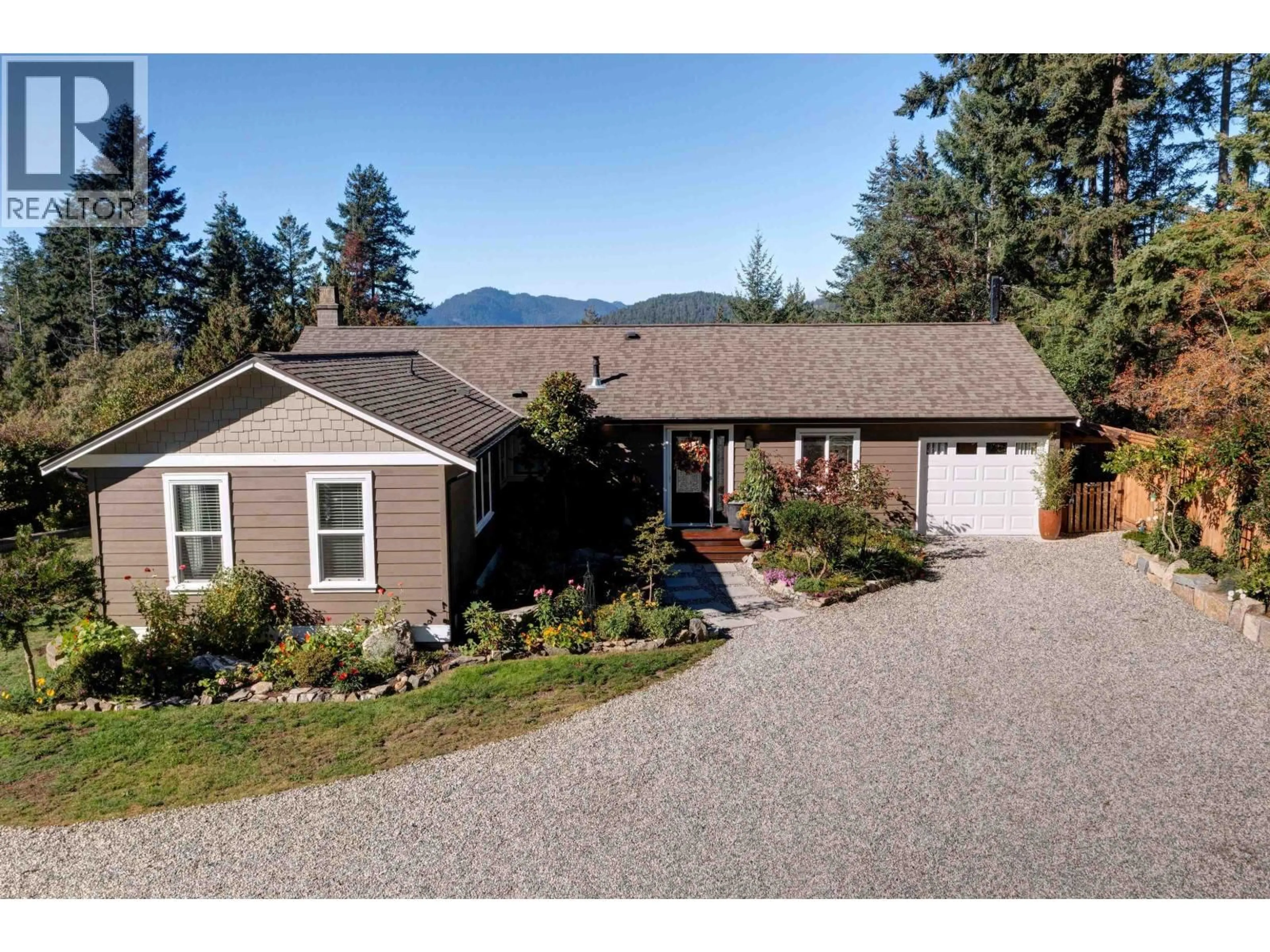 A pic from outside/outdoor area/front of a property/back of a property/a pic from drone, mountain view for 4517 POLLOCK ROAD, Pender Harbour British Columbia V0N2H1