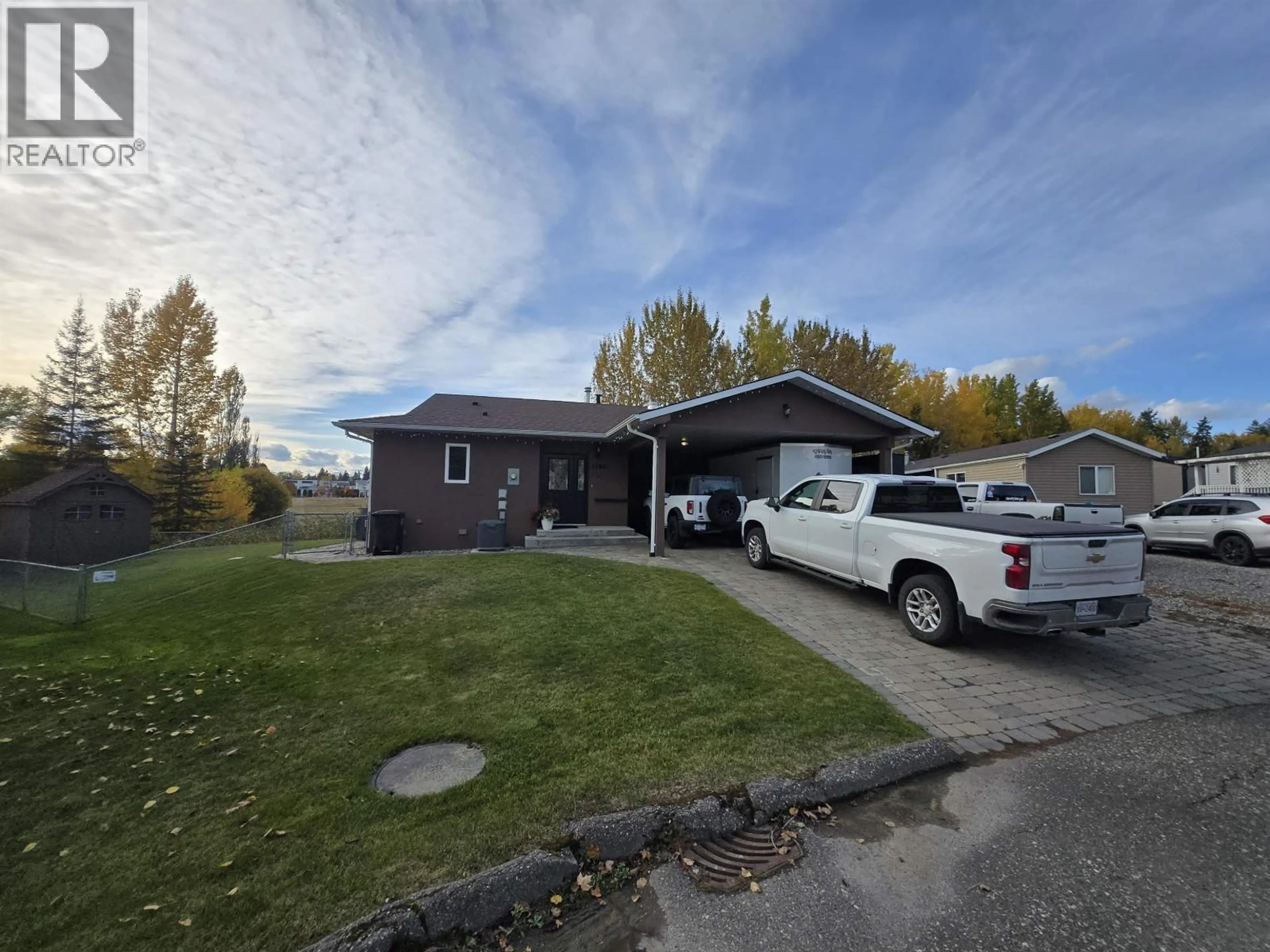 A pic from outside/outdoor area/front of a property/back of a property/a pic from drone, street for 1500 CODY DALE ROAD, Quesnel British Columbia V2J7A1