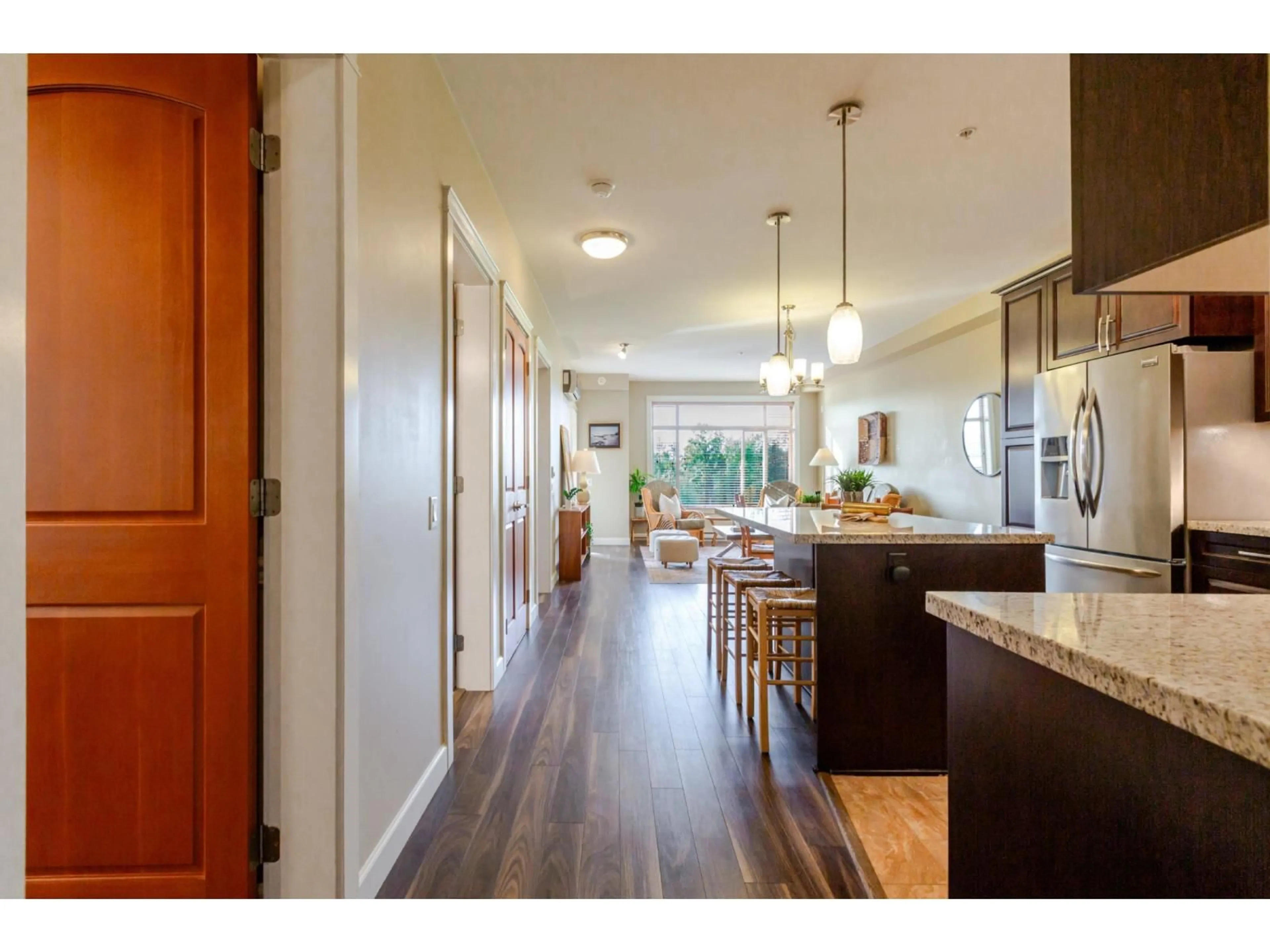 Open concept kitchen, wood/laminate floor for 506 - 8157 207 STREET, Langley British Columbia V2Y0V4