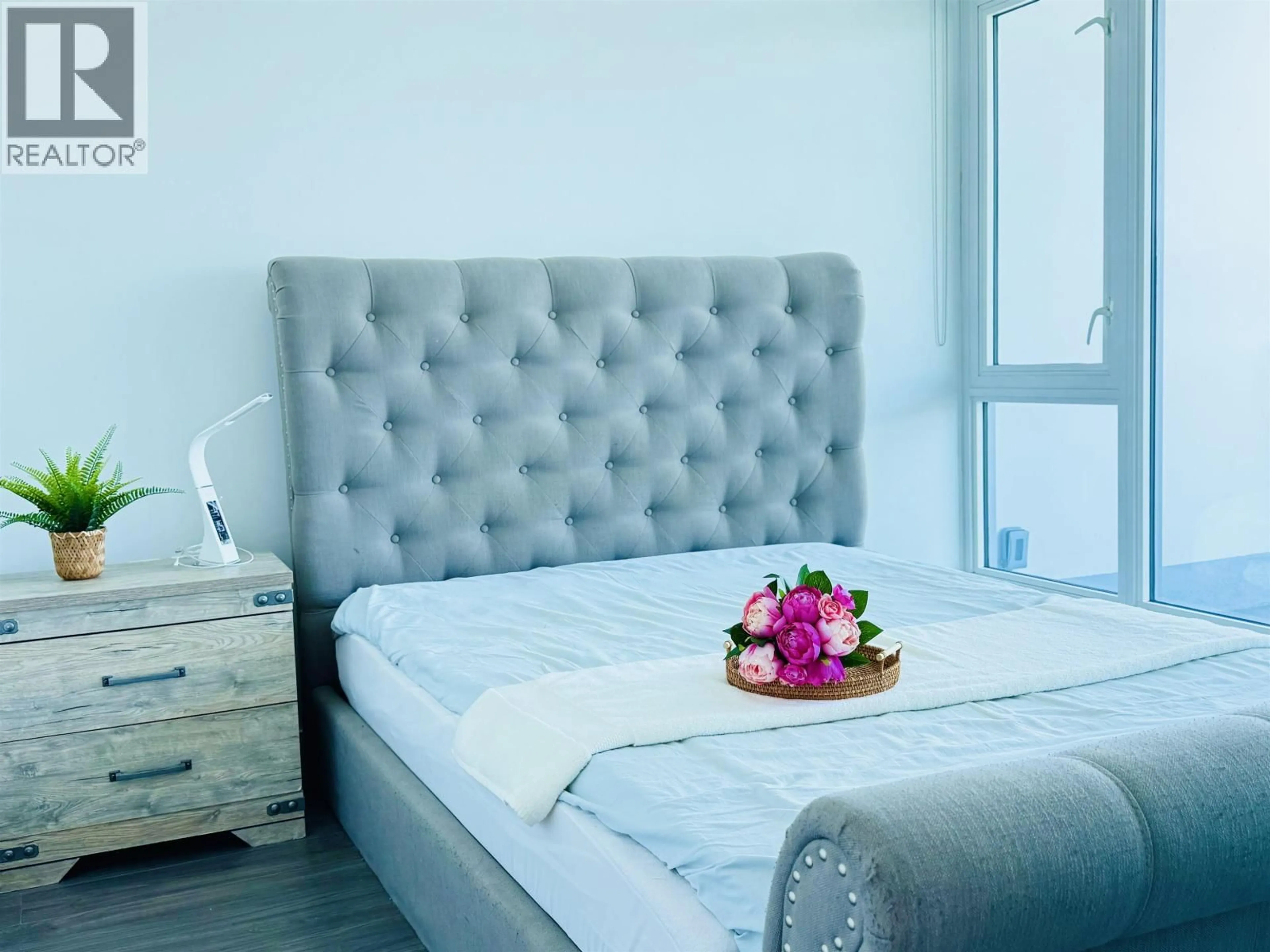 Bedroom with bed, wood/laminate floor for 3006 - 2311 BETA AVENUE, Burnaby British Columbia V5C0M1