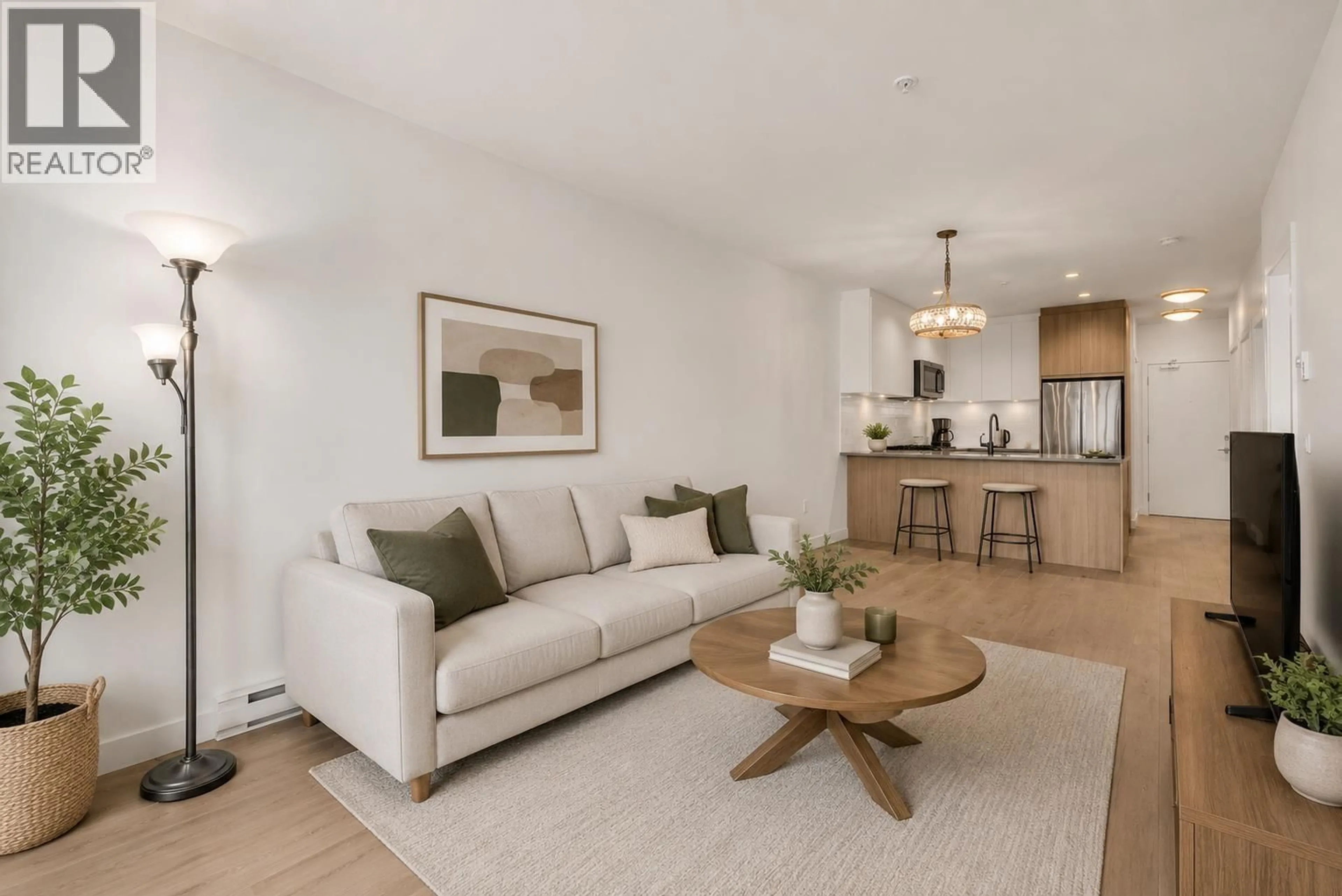 Living room with furniture, unknown for 212 - 707 COMO LAKE AVENUE, Coquitlam British Columbia V3J0J5