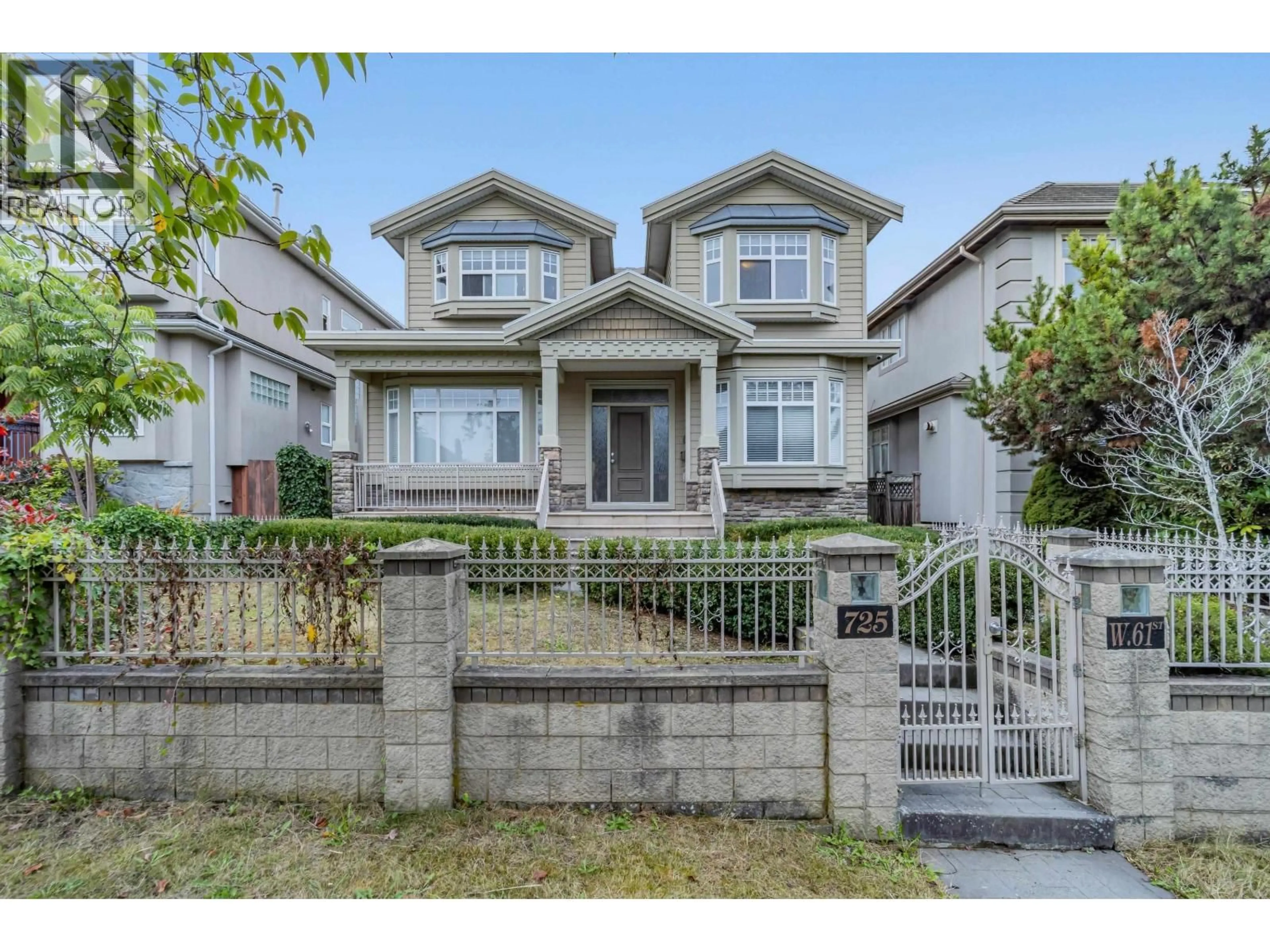 Home with vinyl exterior material, street for 725 61ST AVENUE, Vancouver British Columbia V6P2B6