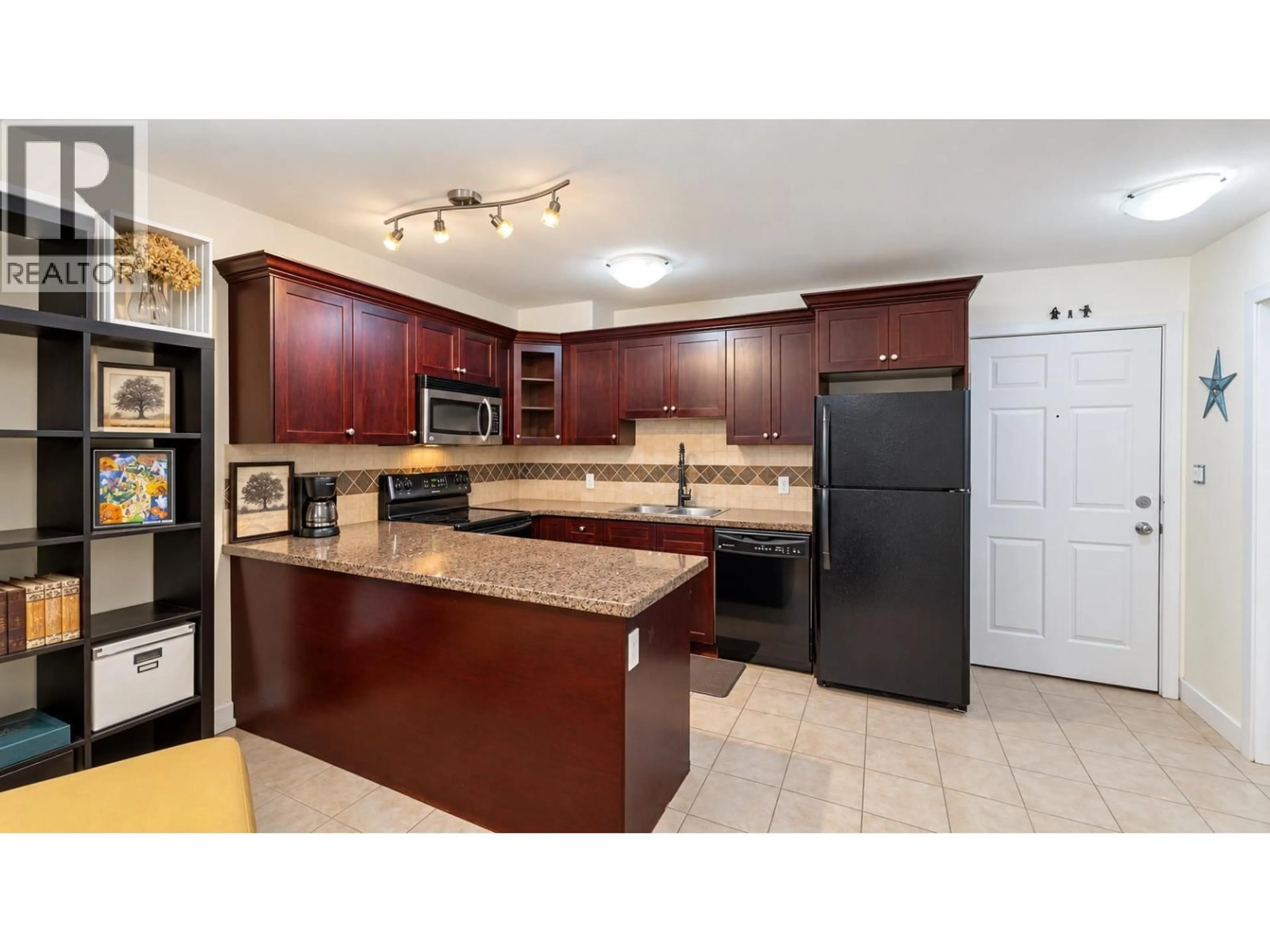 Standard kitchen, ceramic/tile floor for 404 - 1310 VICTORIA STREET, Squamish British Columbia V8B0C3