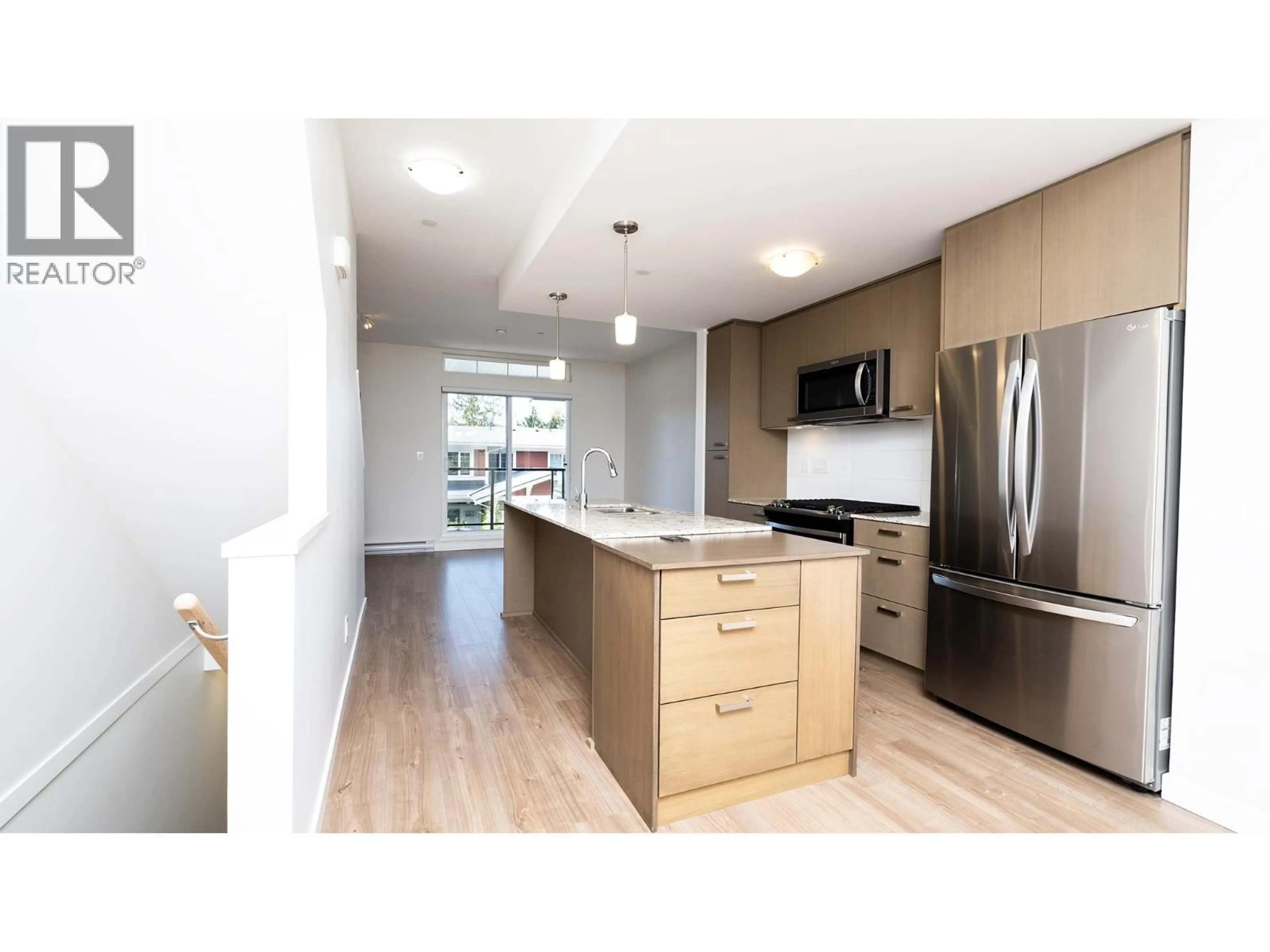 Open concept kitchen, wood/laminate floor for 5902 BEACHGATE LANE, Sechelt British Columbia V7Z0S3