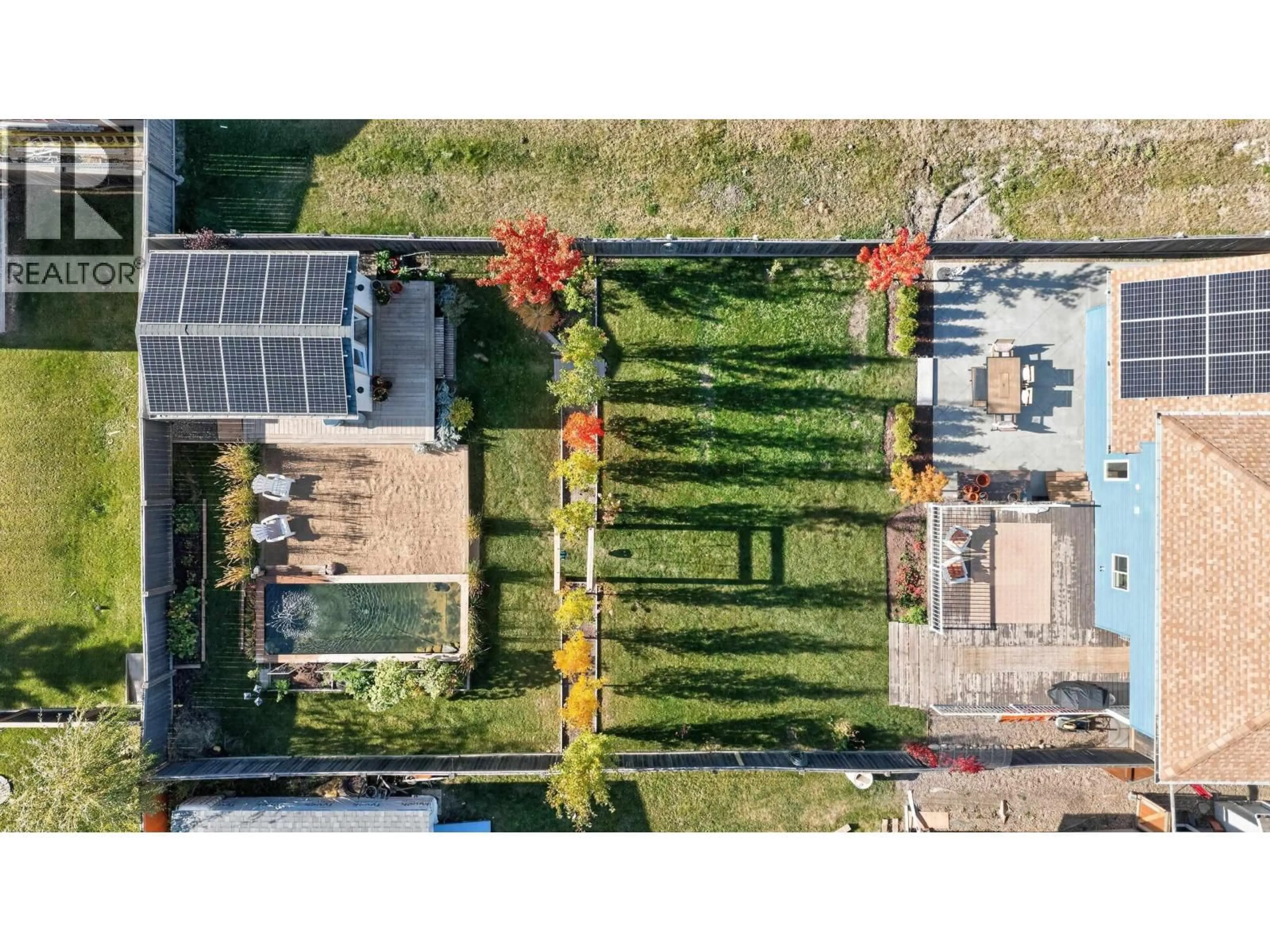 A pic from outside/outdoor area/front of a property/back of a property/a pic from drone, street for 8715 114 AVENUE, Fort St. John British Columbia V1J0C3