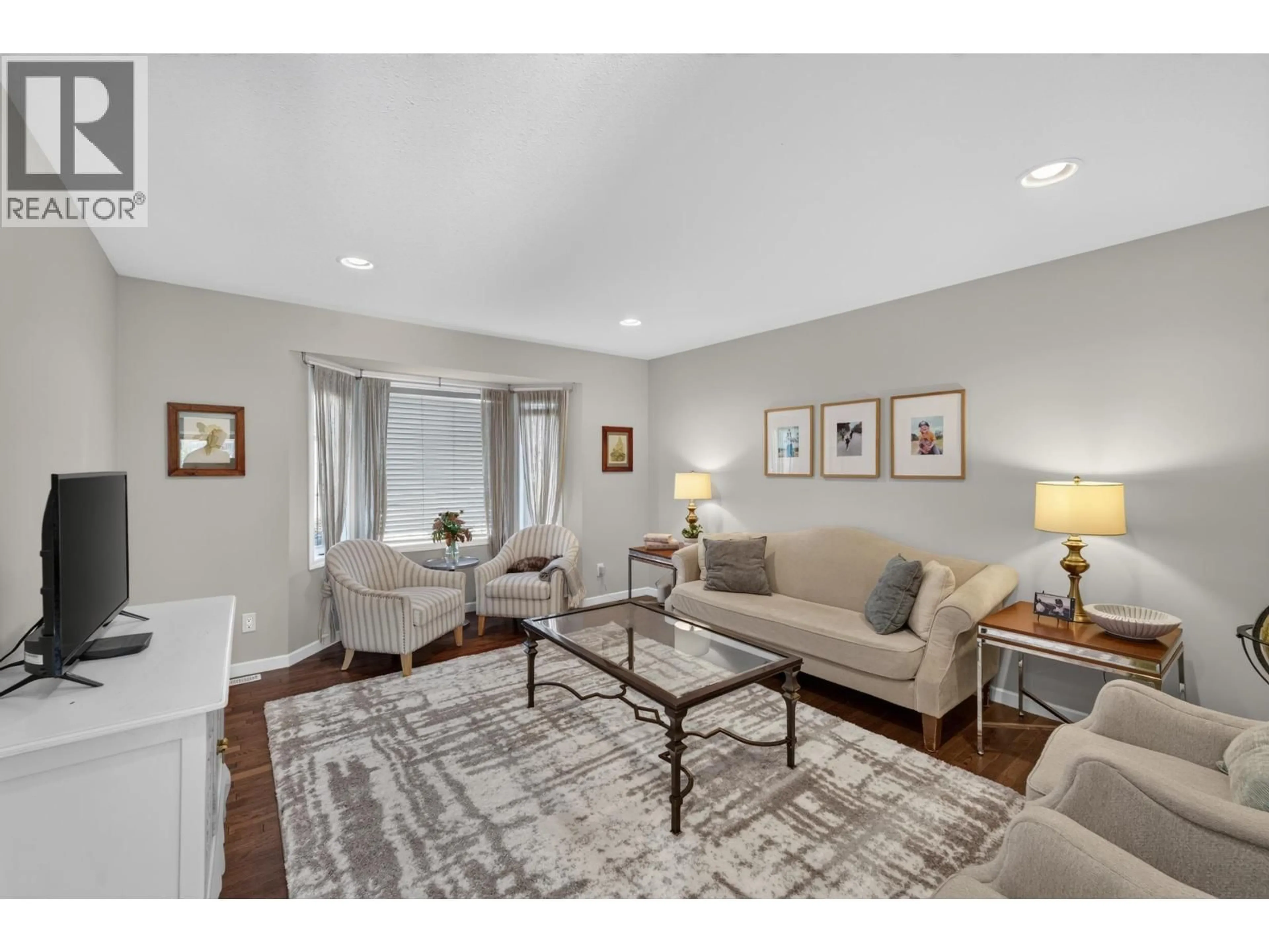 Living room with furniture, unknown for 8715 114 AVENUE, Fort St. John British Columbia V1J0C3