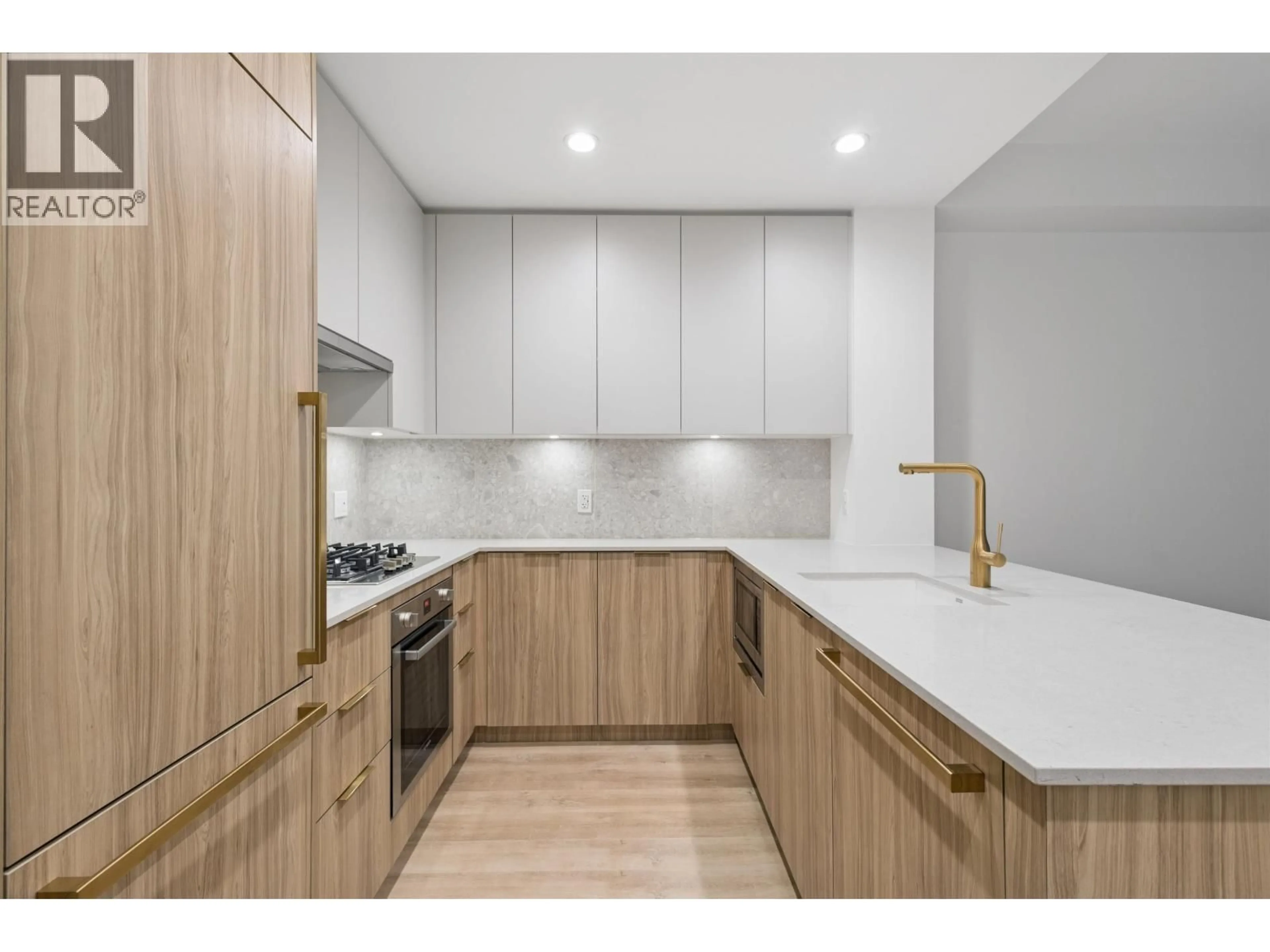 Standard kitchen, wood/laminate floor for 208 - 2375 EMERY COURT, North Vancouver British Columbia V7J0E8