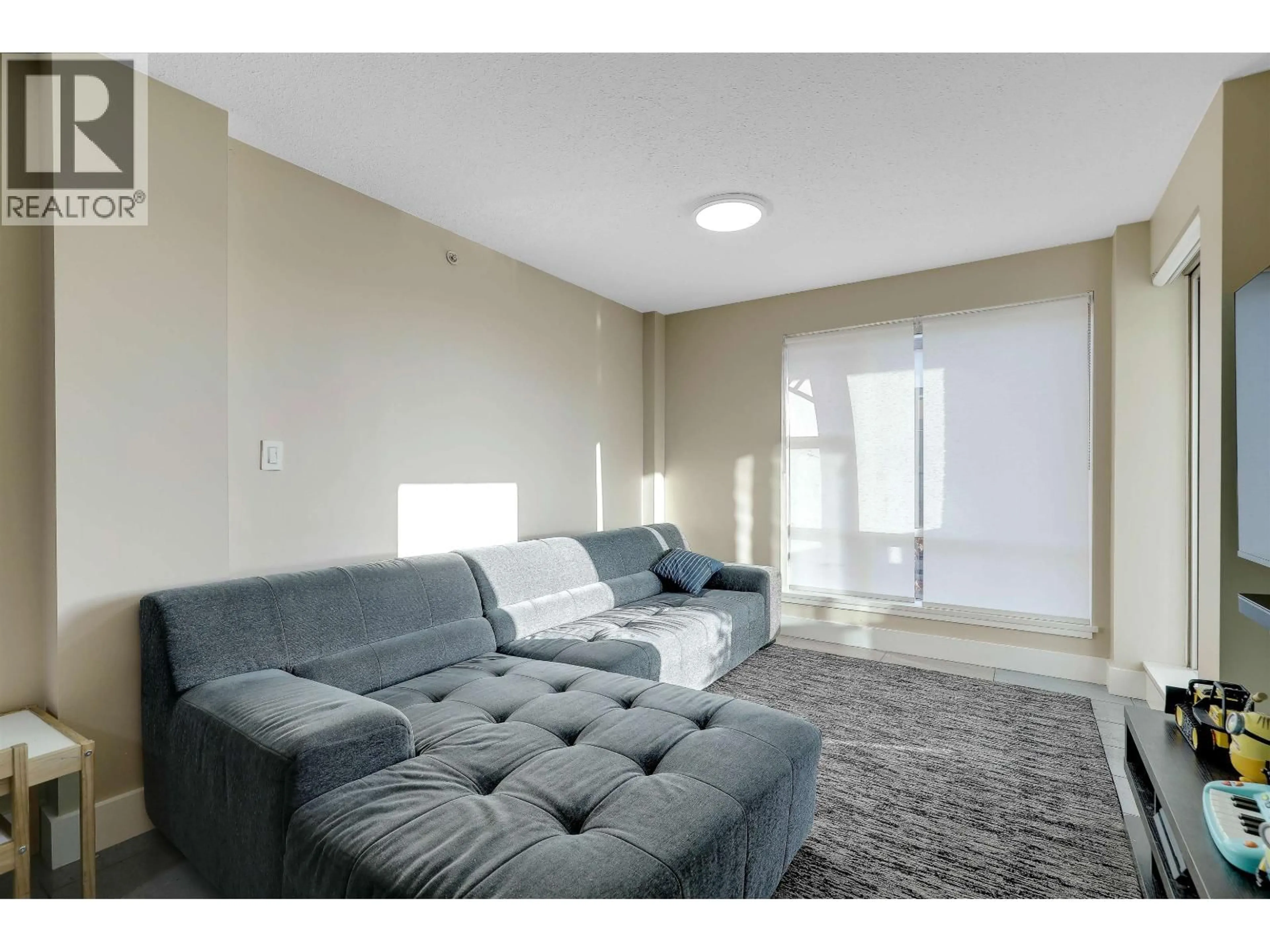 Living room with furniture, unknown for 206 - 3811 HASTINGS STREET, Burnaby British Columbia V5C6V2