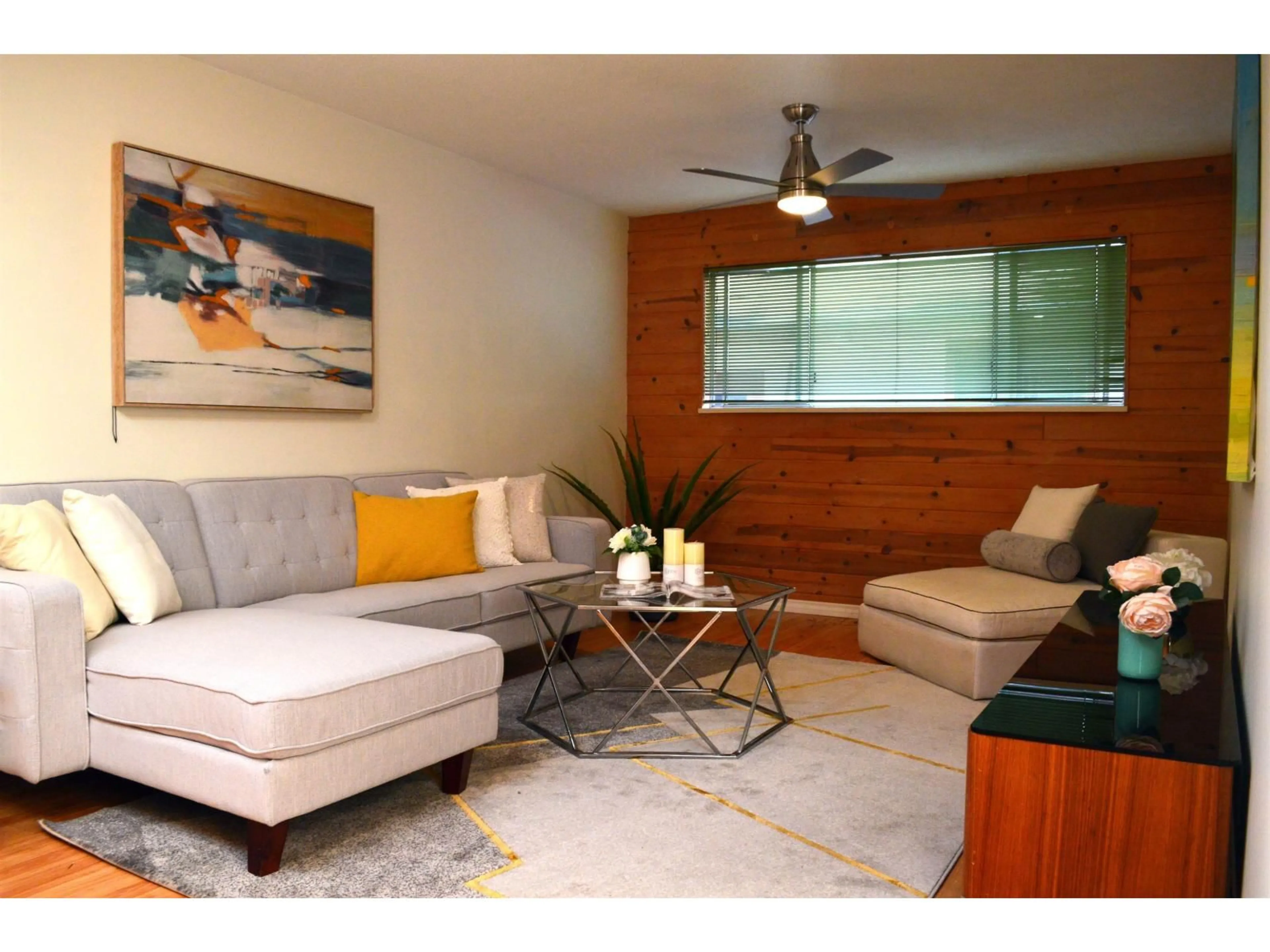 Living room with furniture, wood/laminate floor for 10430 FRASERGLEN DRIVE, Surrey British Columbia V4N1T5