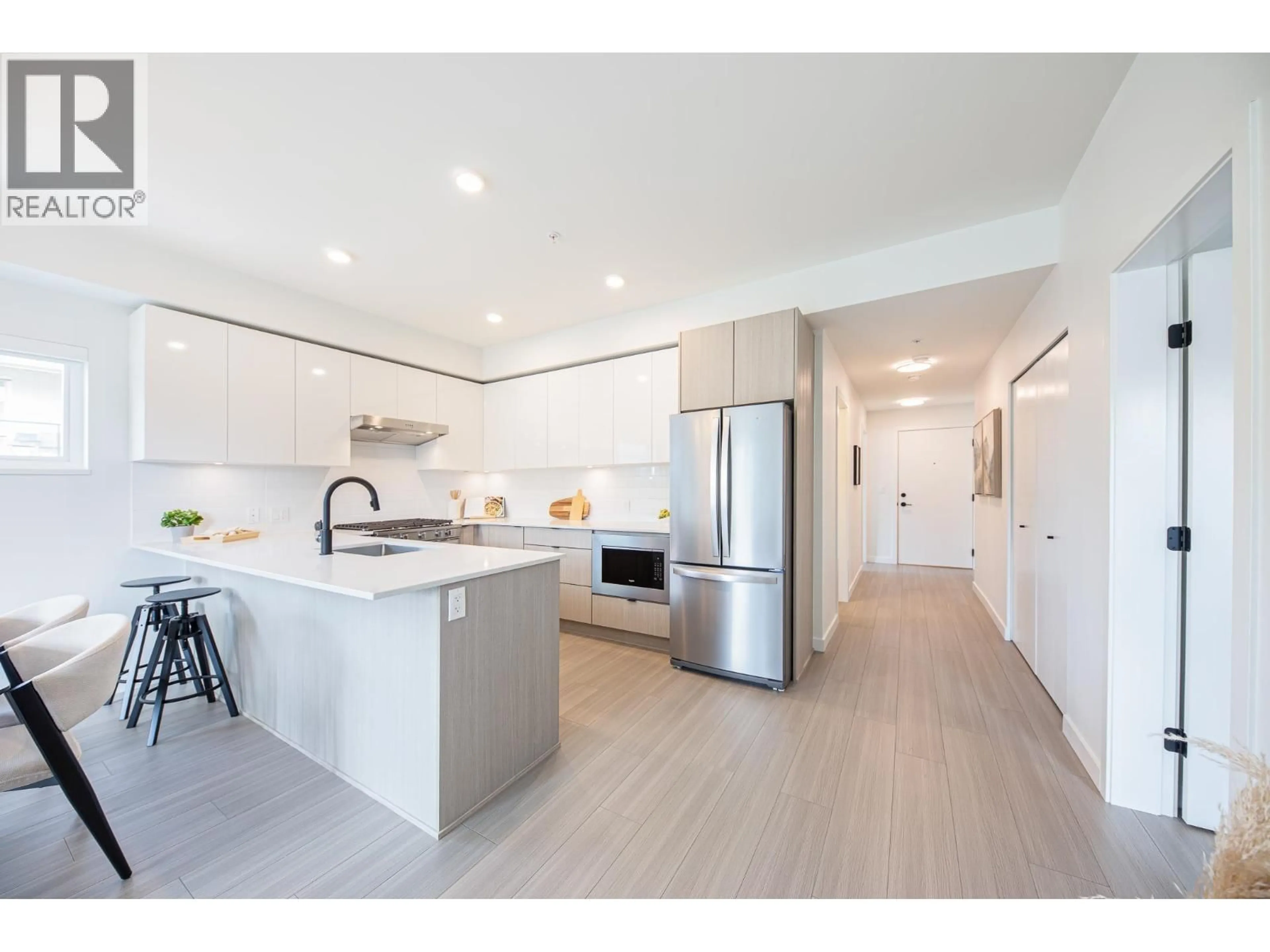 Open concept kitchen, unknown for 202 - 2277 HAWTHORNE AVENUE, Port Coquitlam British Columbia V3C1W7
