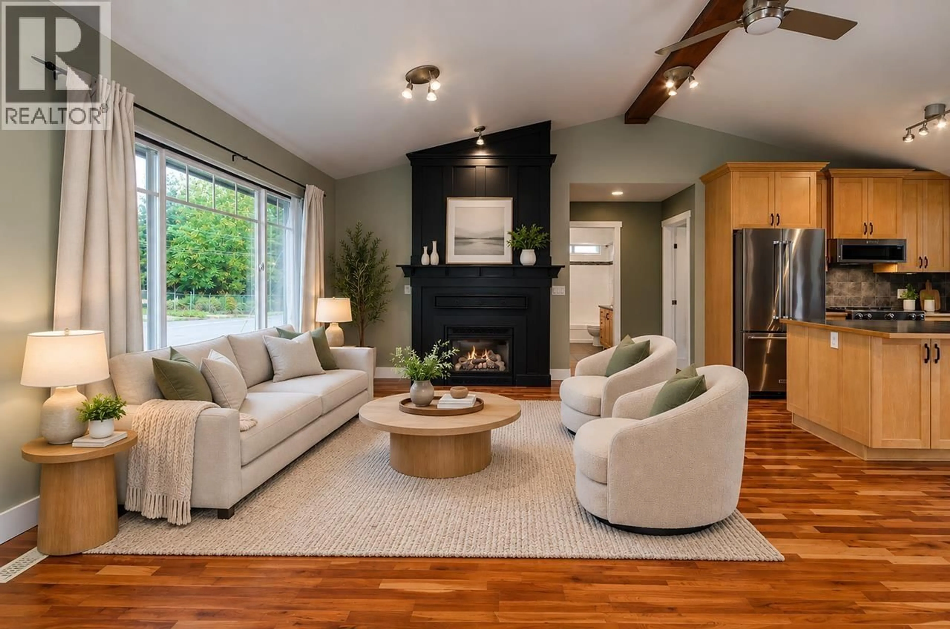 Living room with furniture, wood/laminate floor for 1032 GLENAYRE DRIVE, Port Moody British Columbia V3H1J6