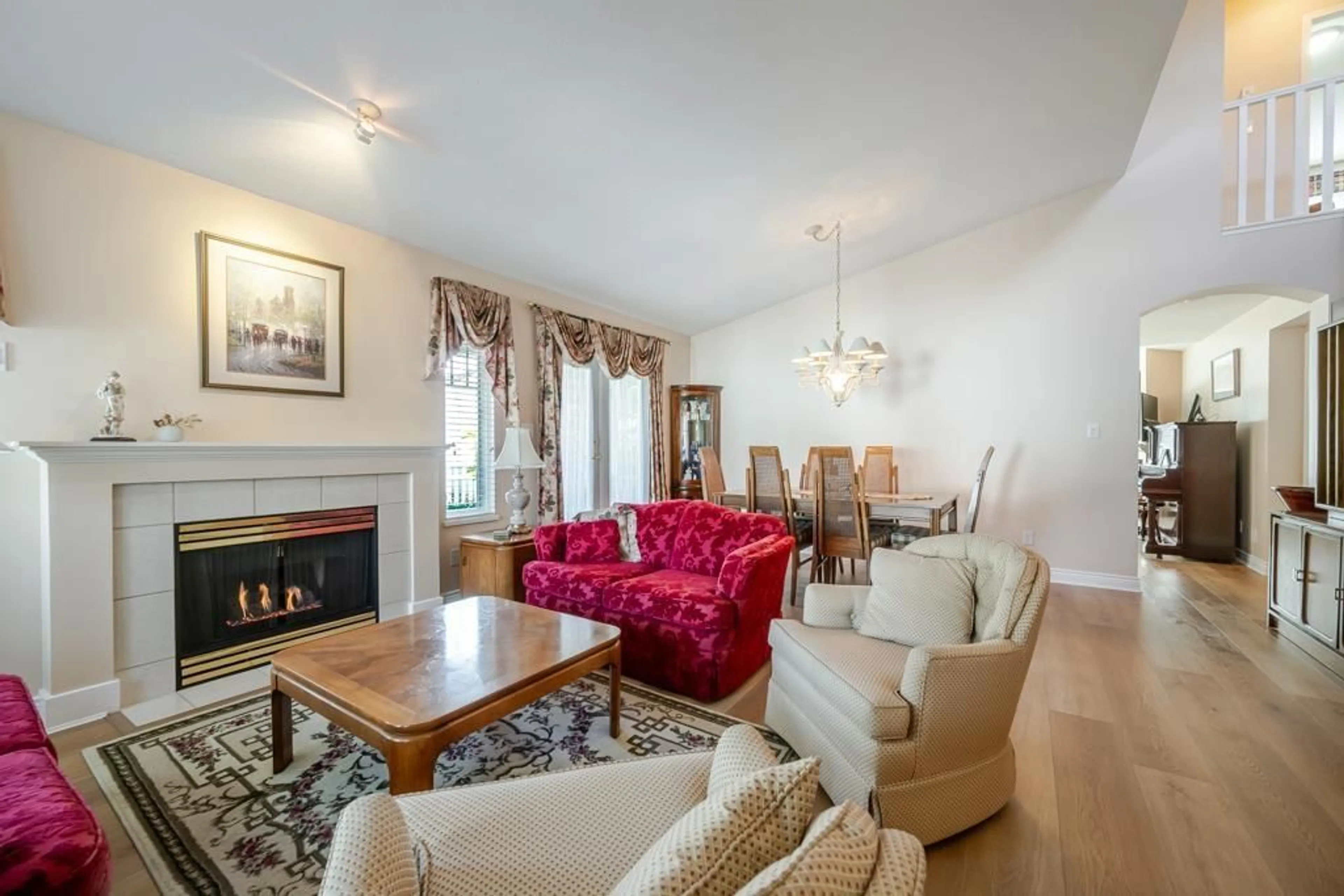 Living room with furniture, wood/laminate floor for 59 - 6488 168 STREET, Surrey British Columbia V3S8Z1