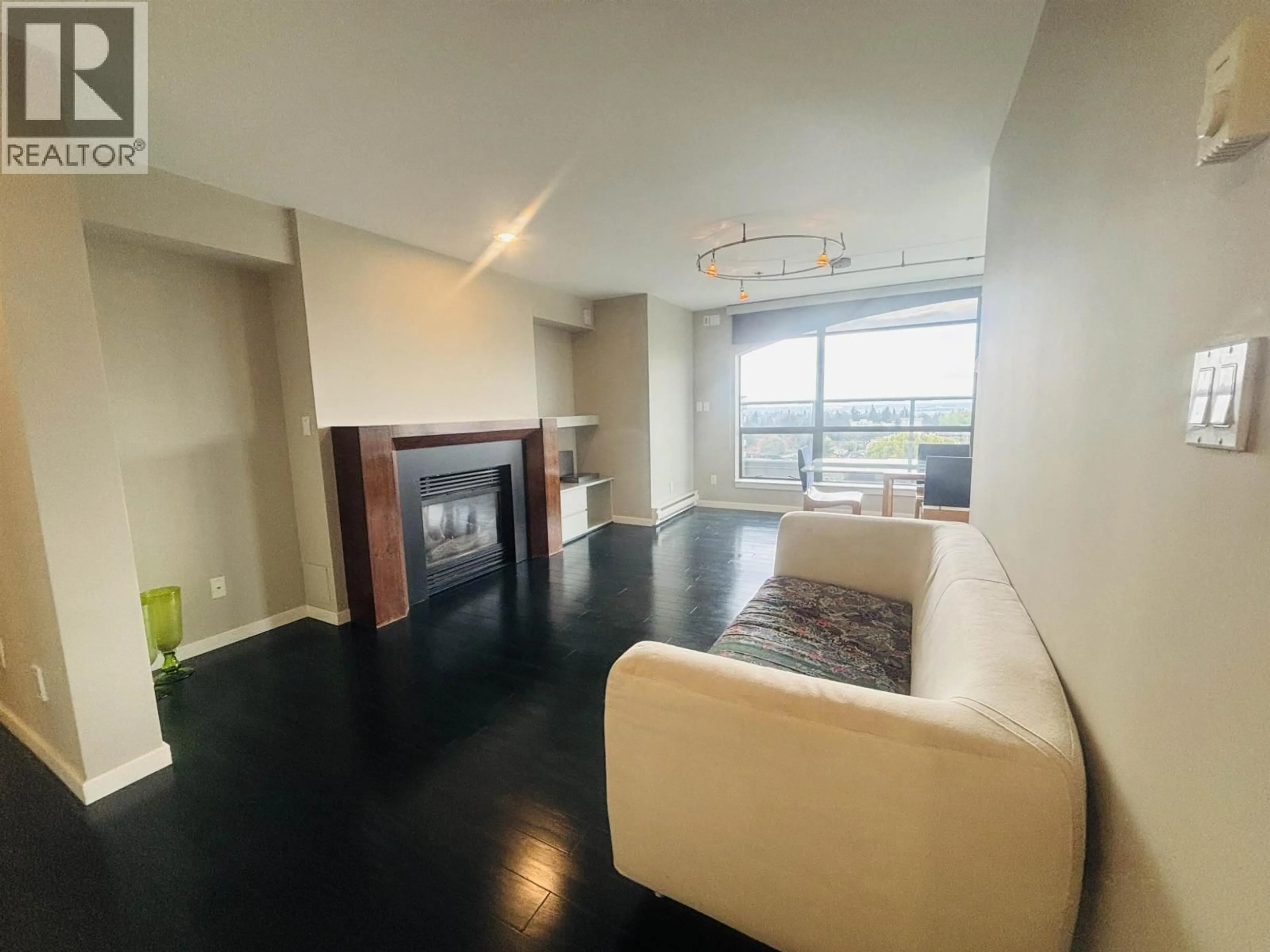 Living room with furniture, unknown for 1100 - 5890 BALSAM STREET, Vancouver British Columbia V6M4B9