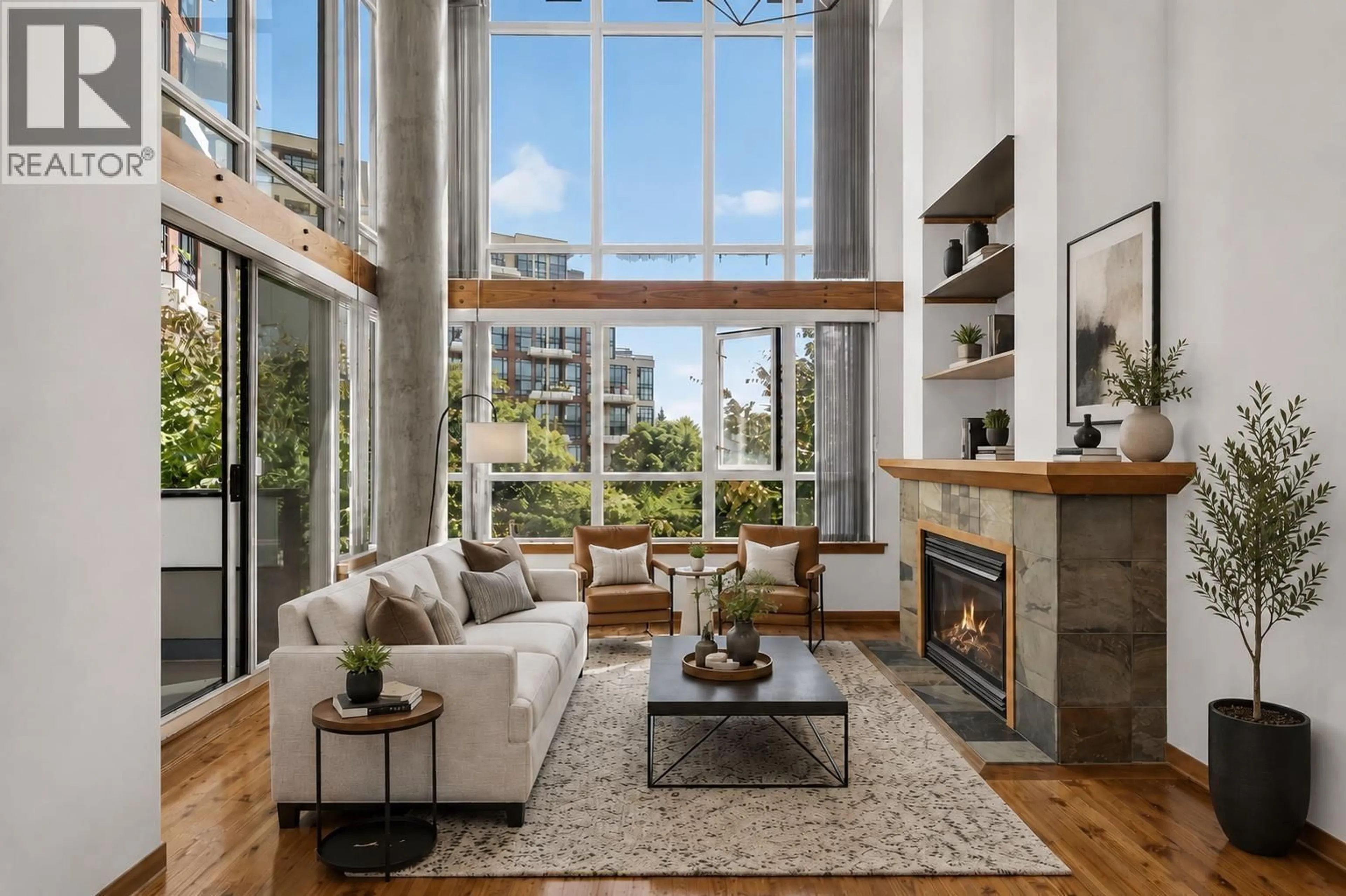 Living room with furniture, unknown for 201 - 7 RIALTO COURT, New Westminster British Columbia V3M7A8