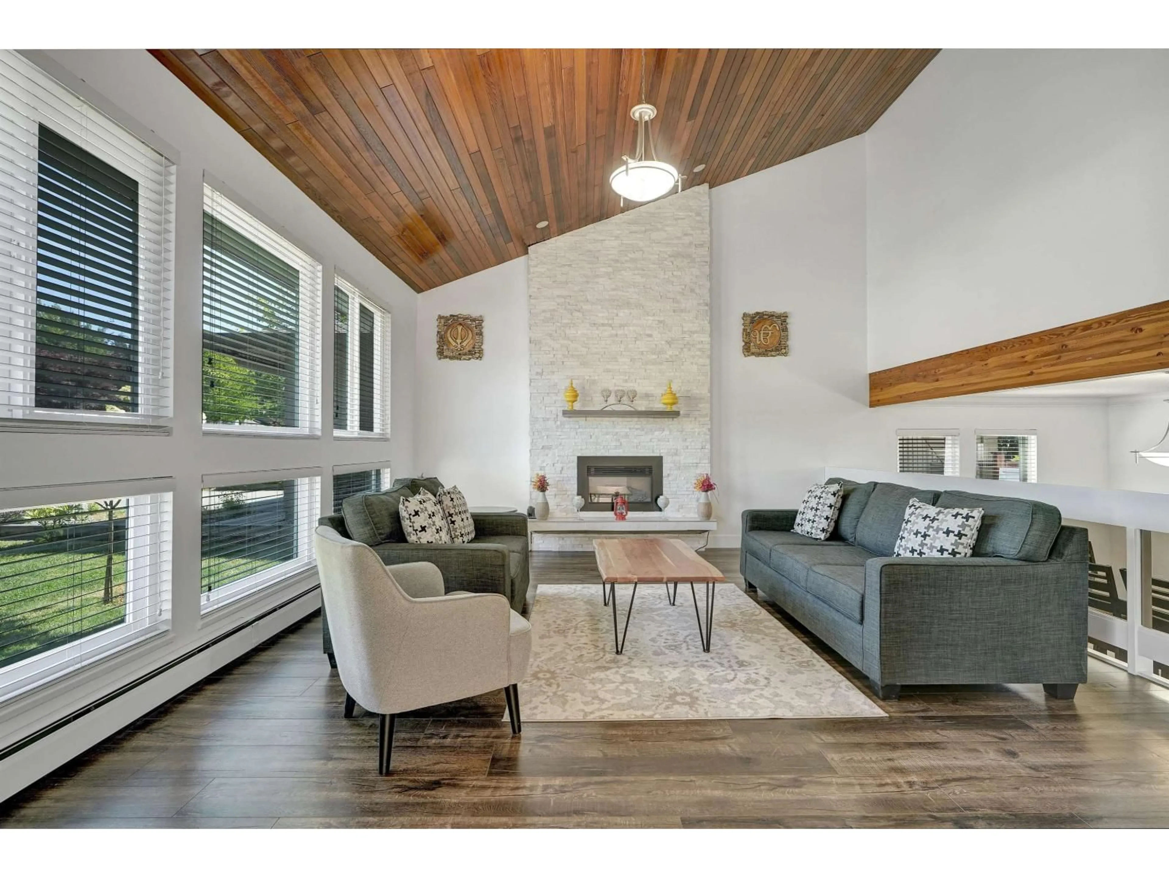 Living room with furniture, wood/laminate floor for 6875 ROCKFORD PLACE, Delta British Columbia V4E2S5