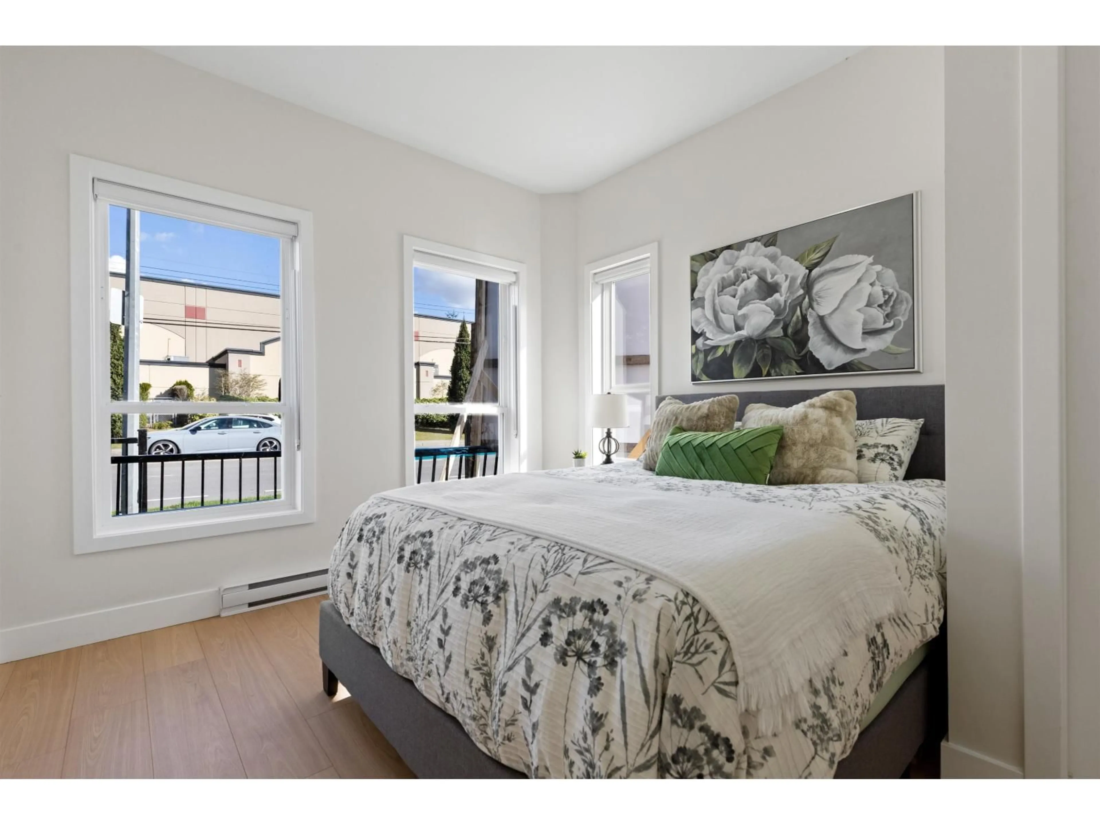 Bedroom with bed, wood/laminate floor for 2 - 31981 CORAL AVENUE, Abbotsford British Columbia V2T2J9