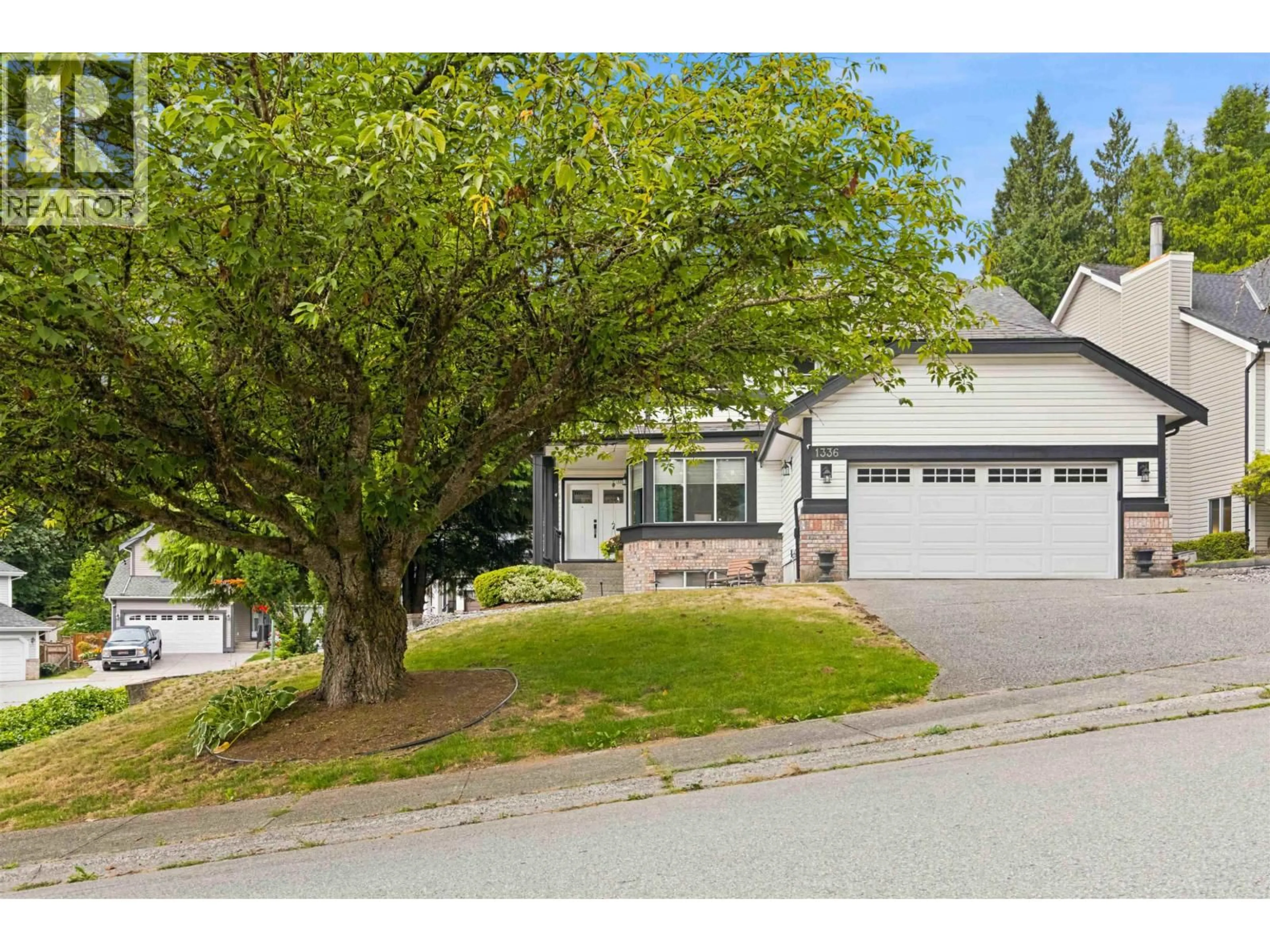 Home with vinyl exterior material, street for 1336 CIMARRON DRIVE, Coquitlam British Columbia V3B7E5