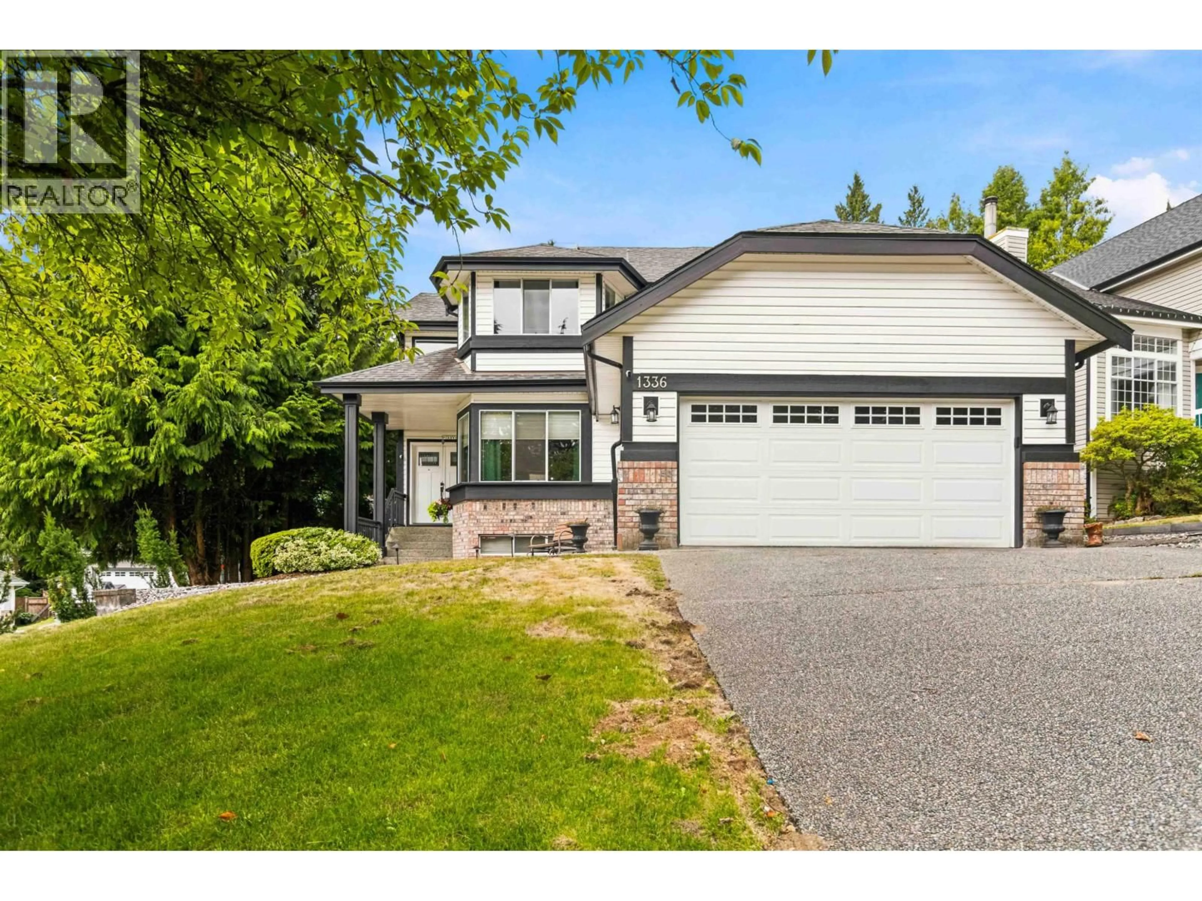 Home with vinyl exterior material, street for 1336 CIMARRON DRIVE, Coquitlam British Columbia V3B7E5