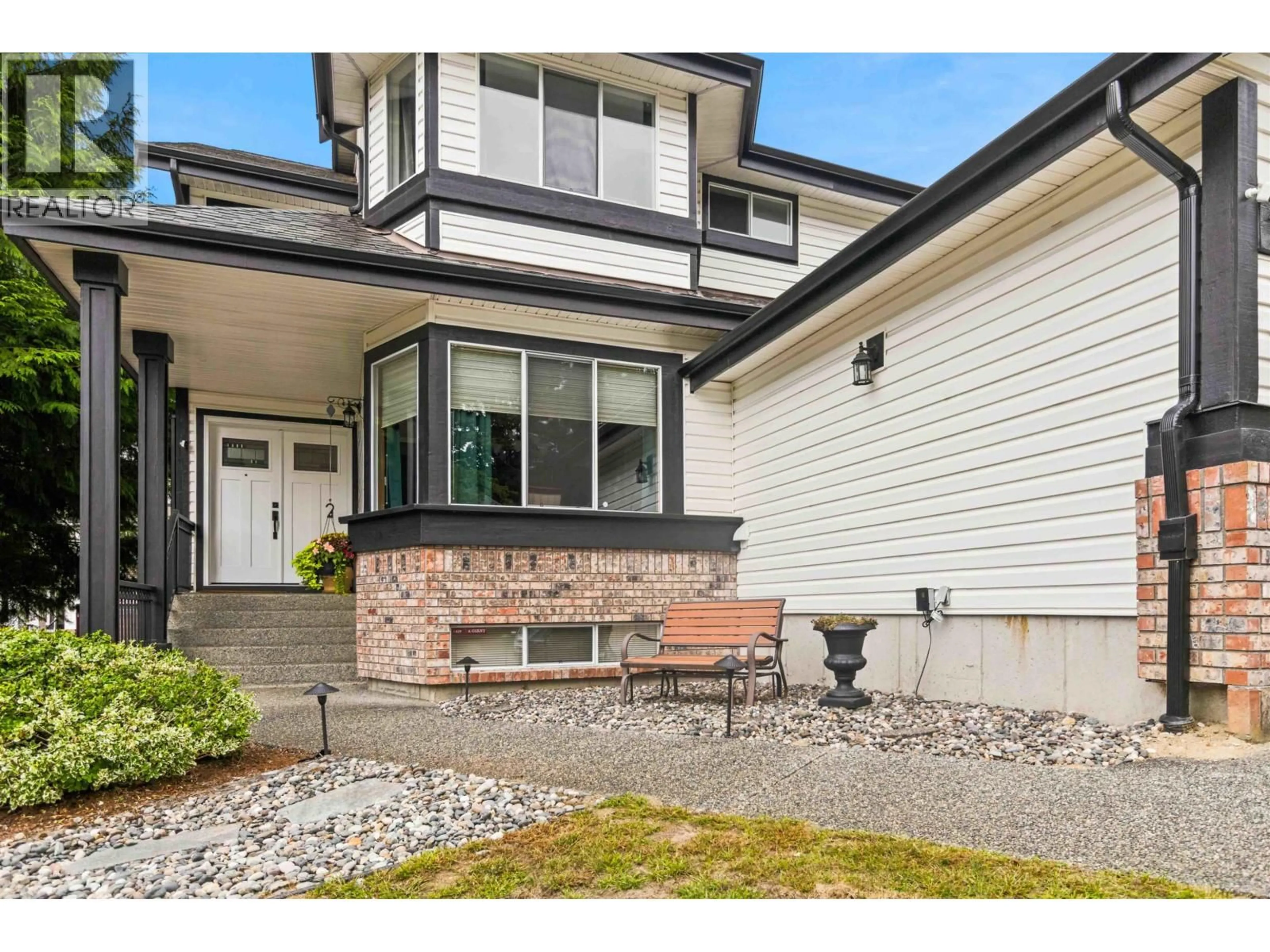 Home with vinyl exterior material, street for 1336 CIMARRON DRIVE, Coquitlam British Columbia V3B7E5