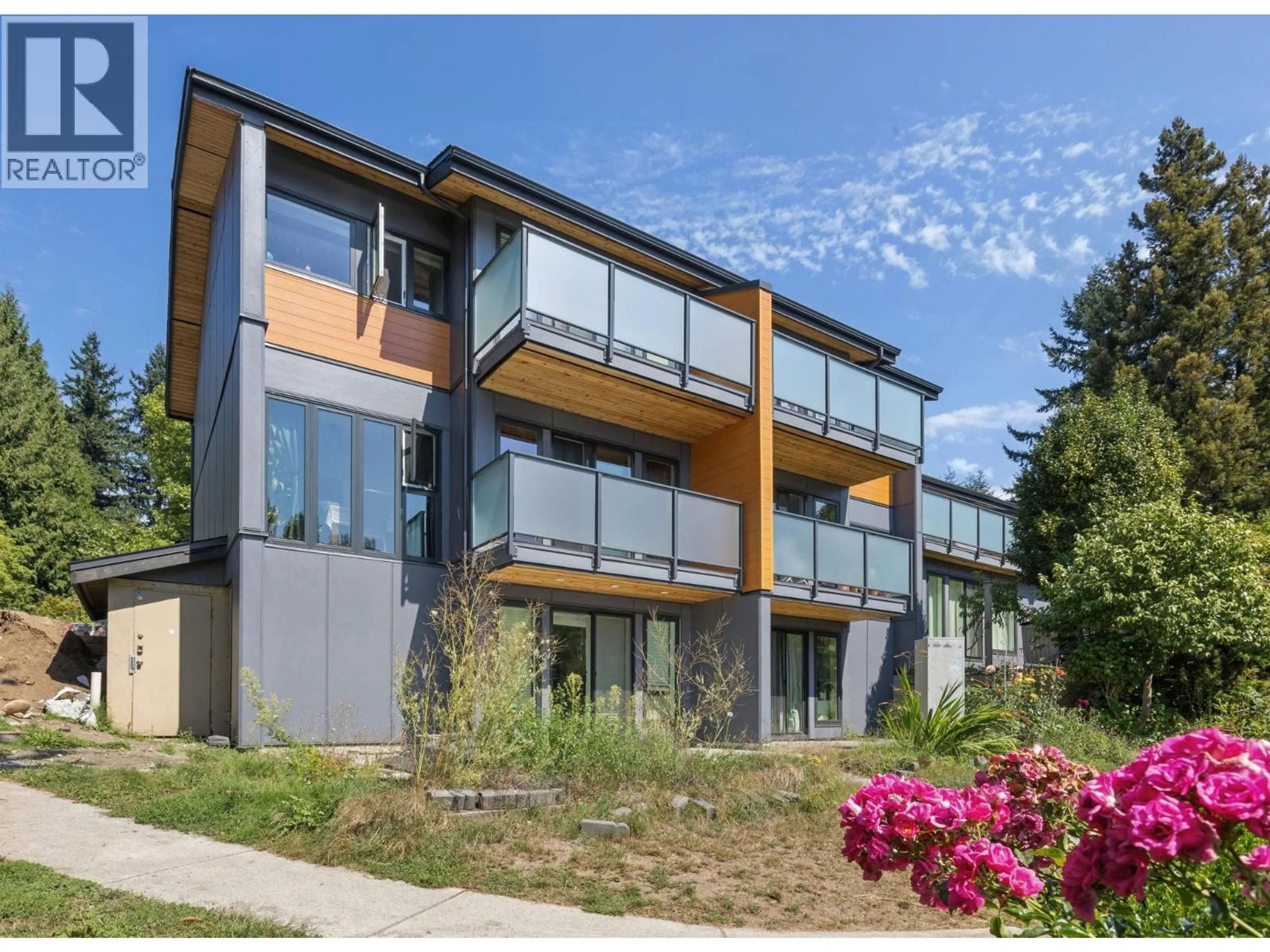 Home with brick exterior material, unknown for 1084 LILLOOET ROAD, North Vancouver British Columbia V7J2H8