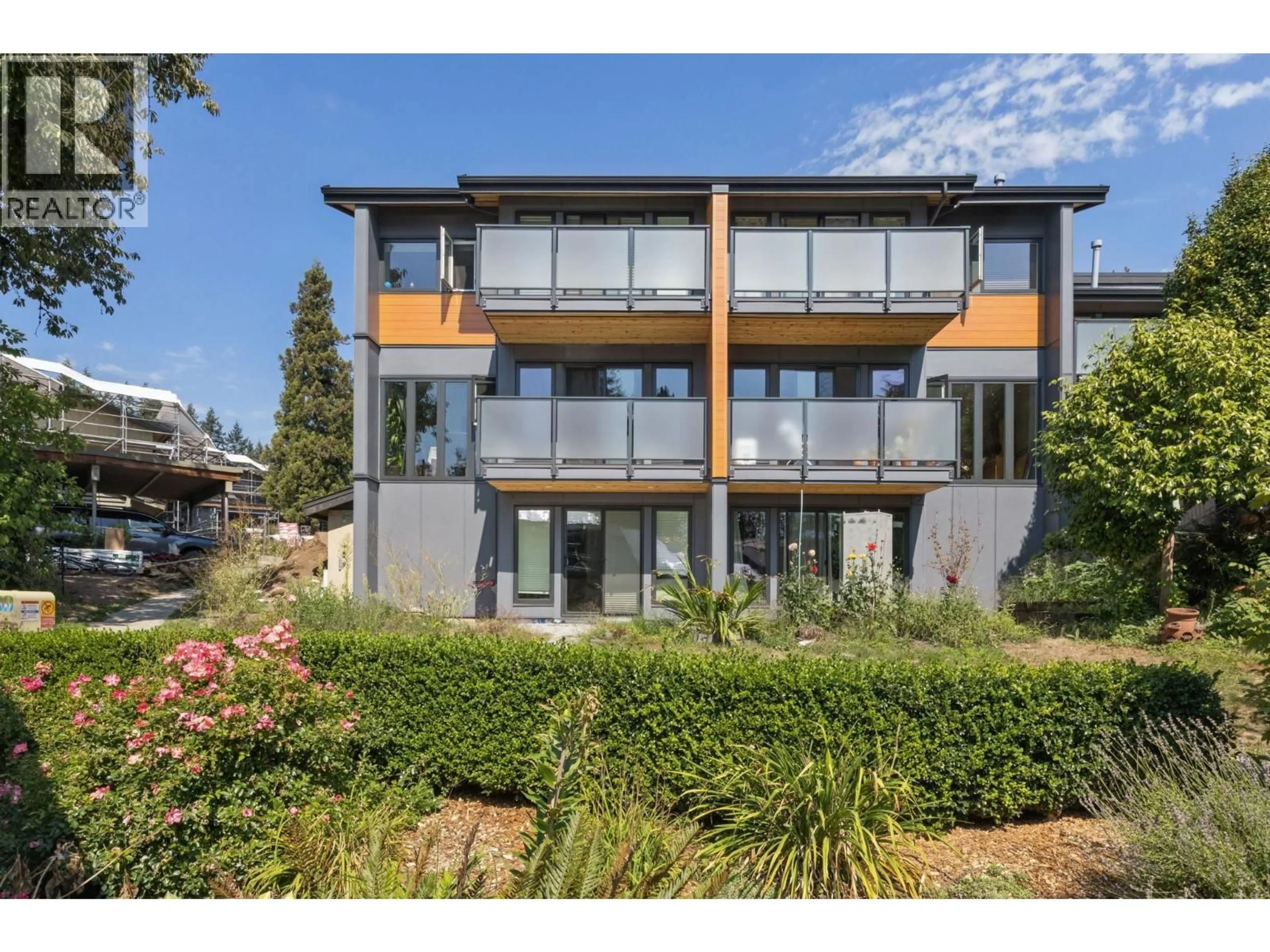 A pic from outside/outdoor area/front of a property/back of a property/a pic from drone, street for 1084 LILLOOET ROAD, North Vancouver British Columbia V7J2H8